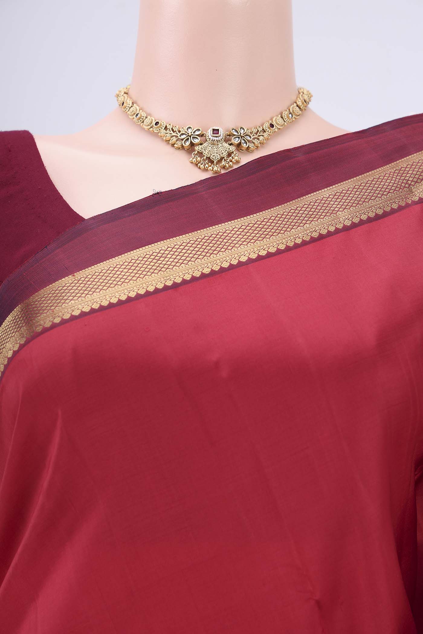 Border image of Pure Silk Pure Zari Deep Red Kanjivaram Saree with Zari Butta on the body and Zari Border. 