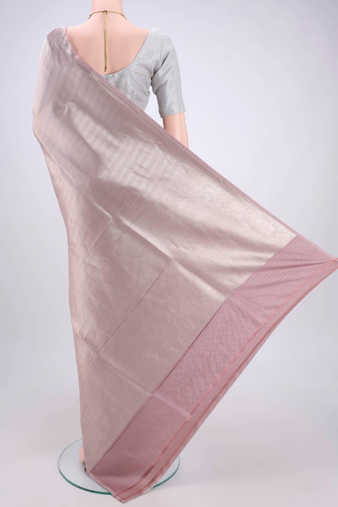 Flat view of Mauve Banarasi Saree with Zari Brocade on the body and Thread Border. 