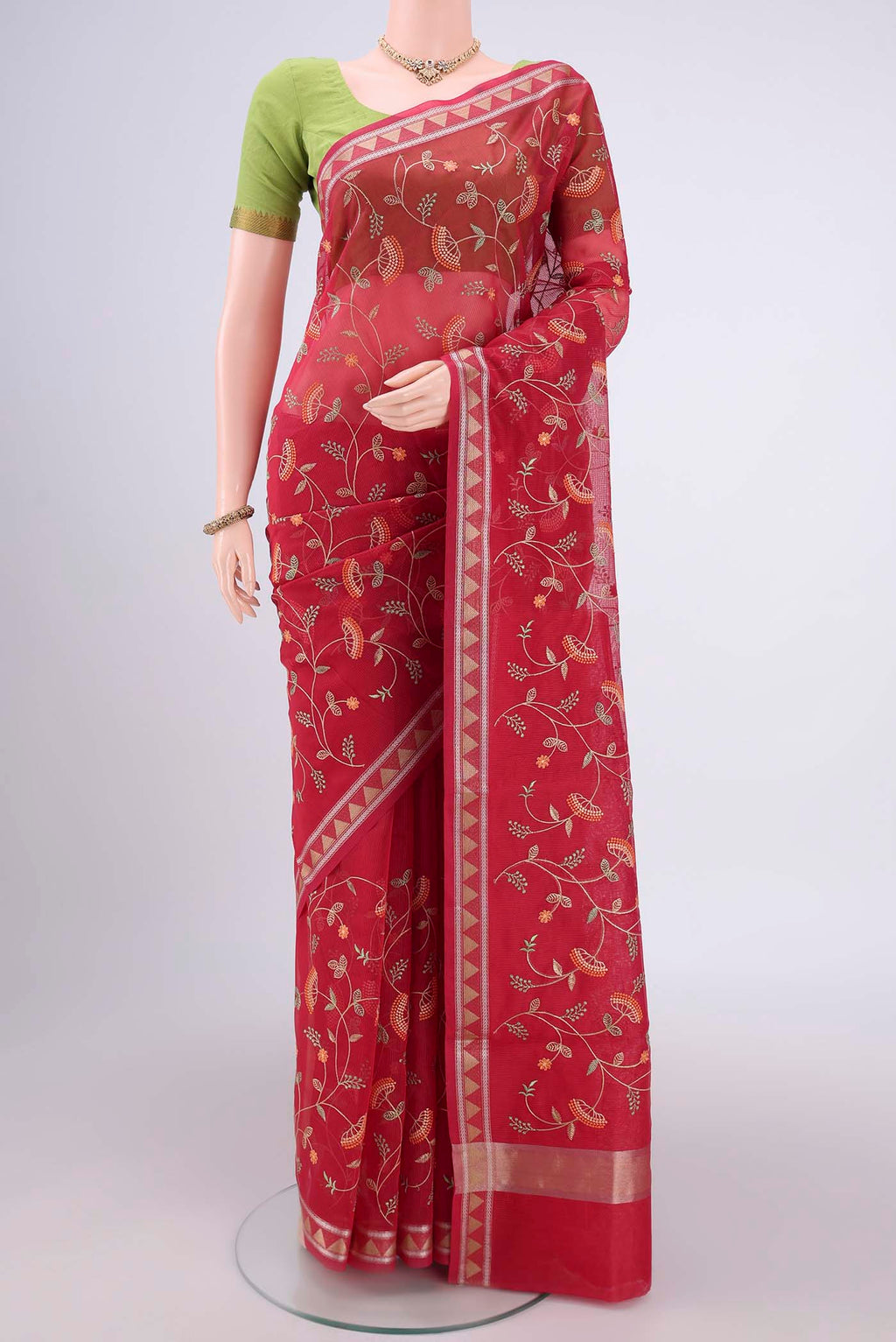 Dark Pink Blended Kota Cotton Saree with Embroidery on the body and Zari Border.  displayed on a mannequin