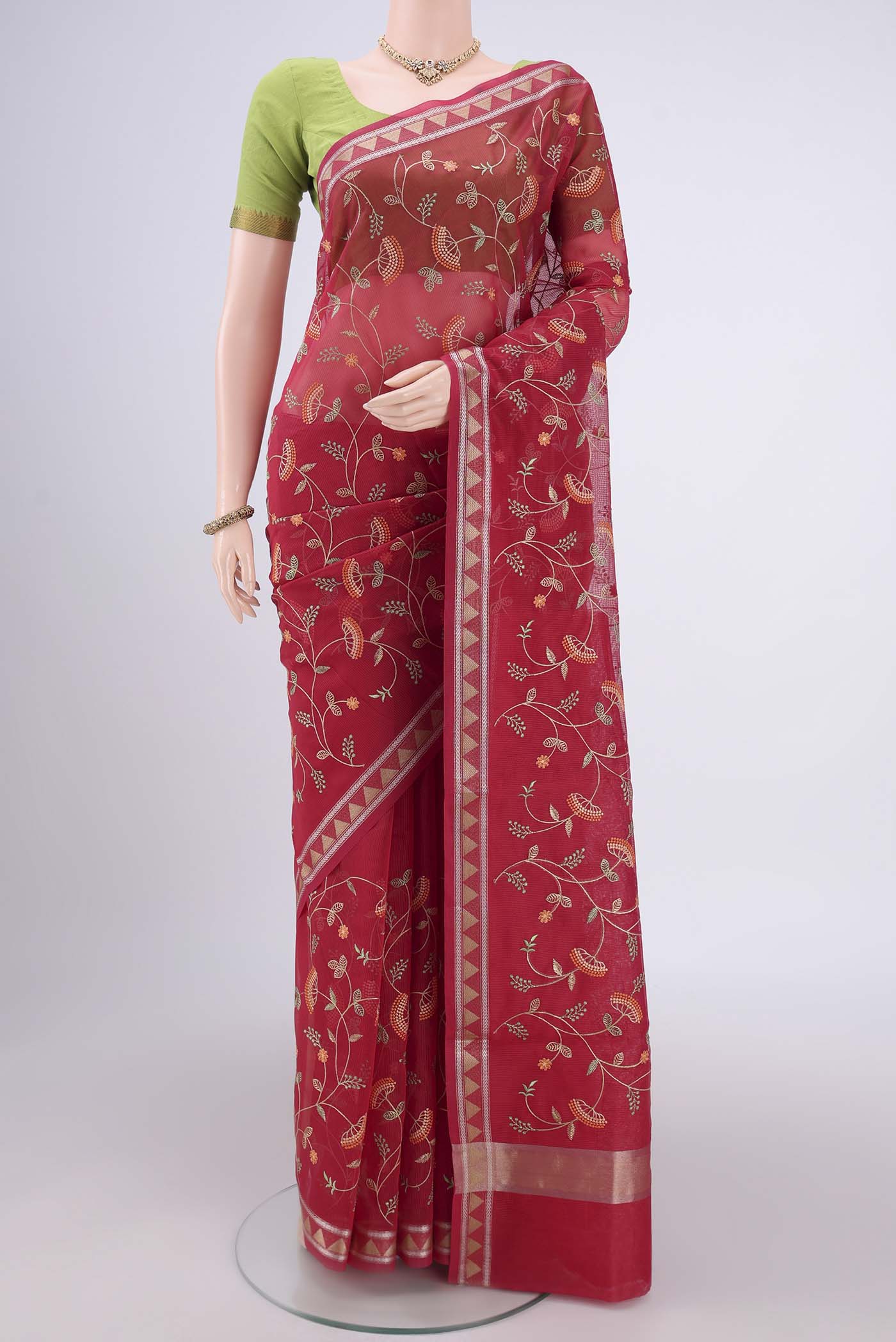 Dark Pink Blended Kota Cotton Saree with Embroidery on the body and Zari Border.  displayed on a mannequin