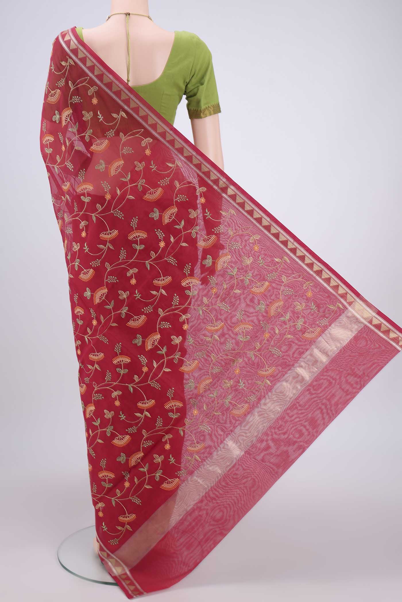 Flat view of Dark Pink Blended Kota Cotton Saree with Embroidery on the body and Zari Border. 
