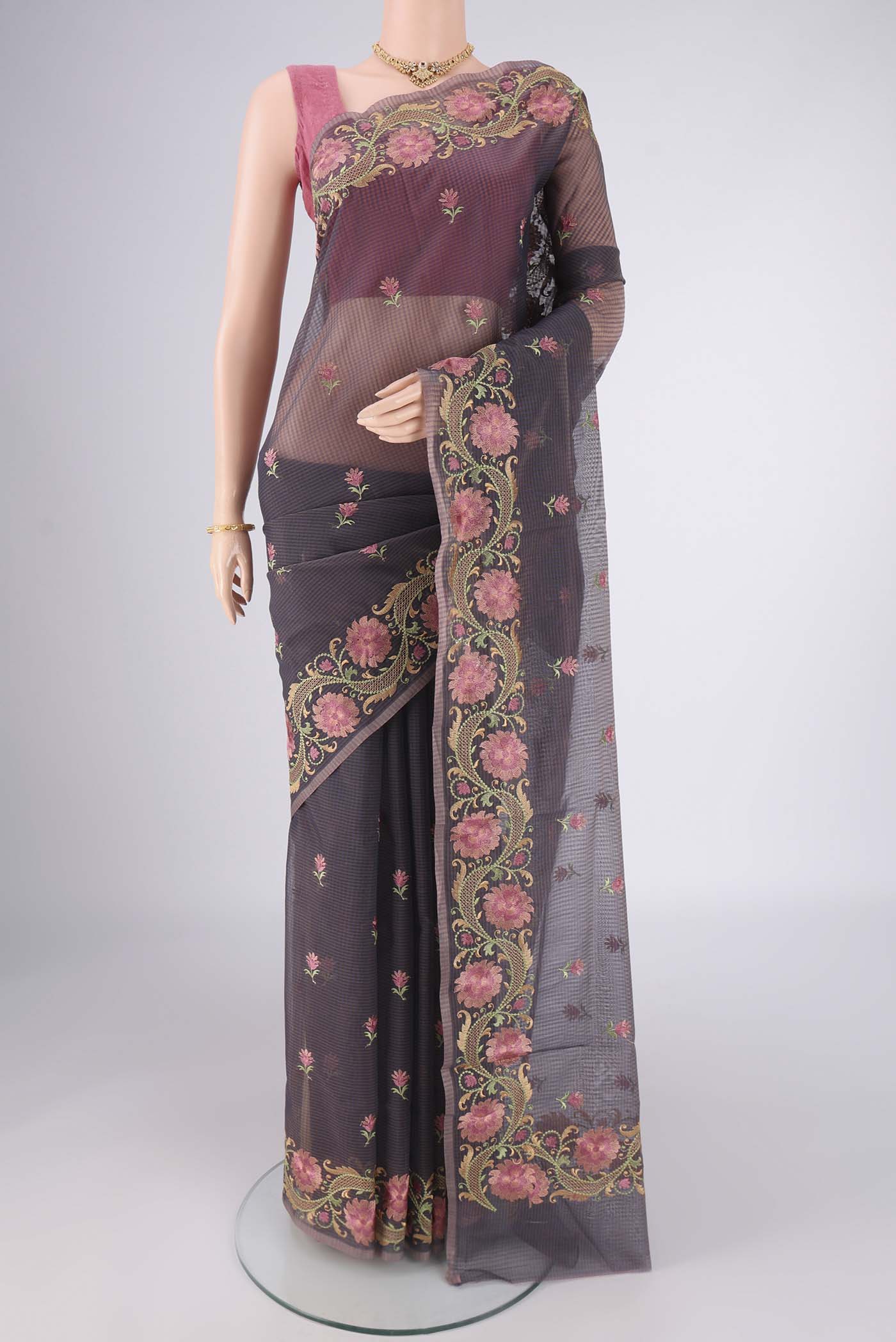 Davys Grey Blended Kota Cotton Saree with Embroidery on the body and Embroidery Border.  displayed on a mannequin