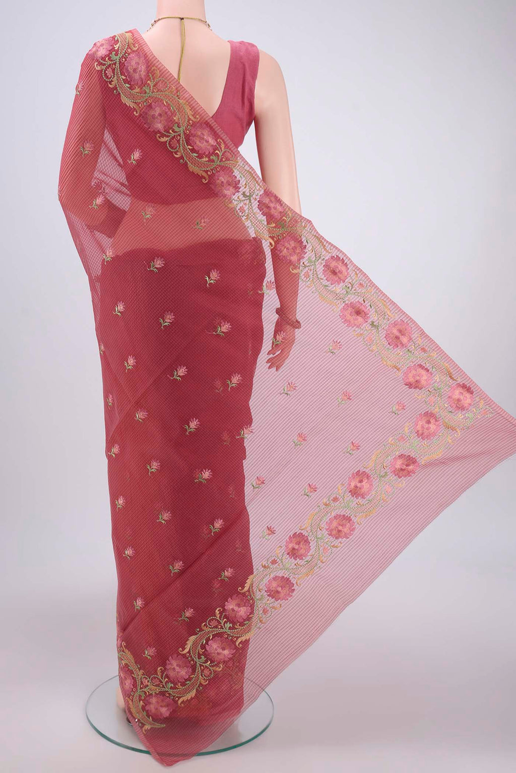 Flat view of Coral Kota Cotton Saree with Embroidery on the body and Thread Border. 