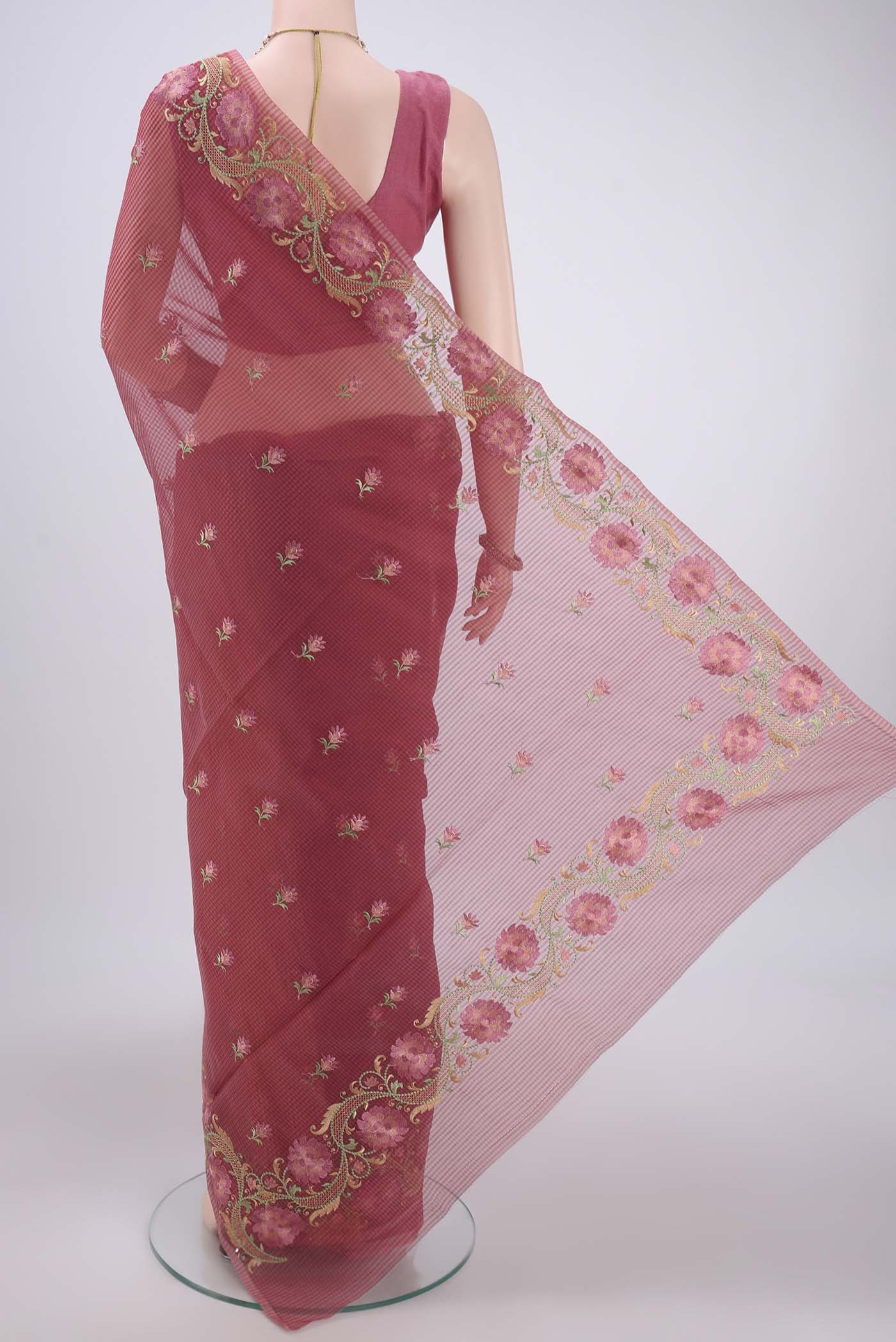 Flat view of Coral Kota Cotton Saree with Embroidery on the body and Thread Border. 