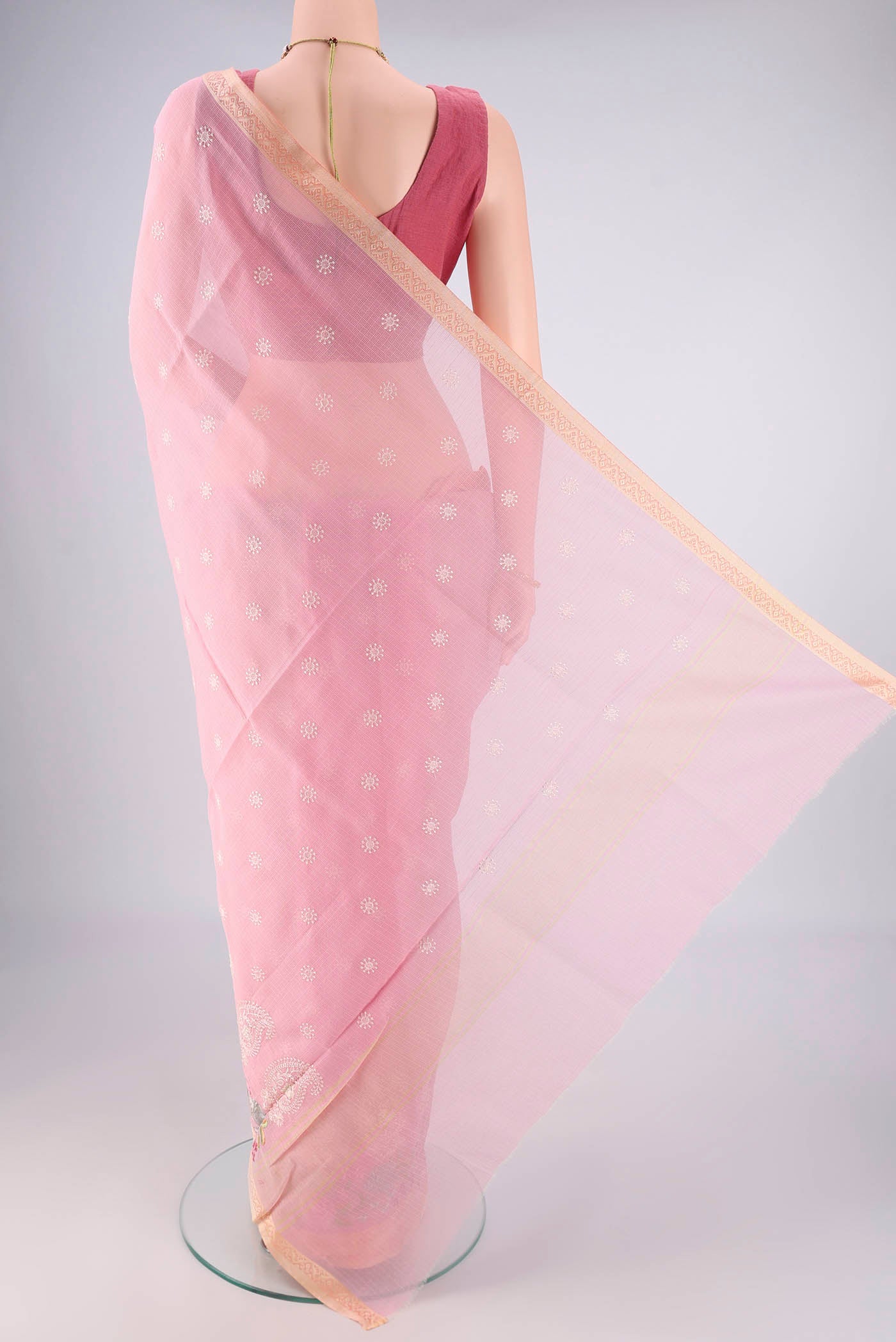 Flat view of Rose pink Dual Tone Blended Kota Cotton Saree with Embroidery on the body and Embroidery Border. 