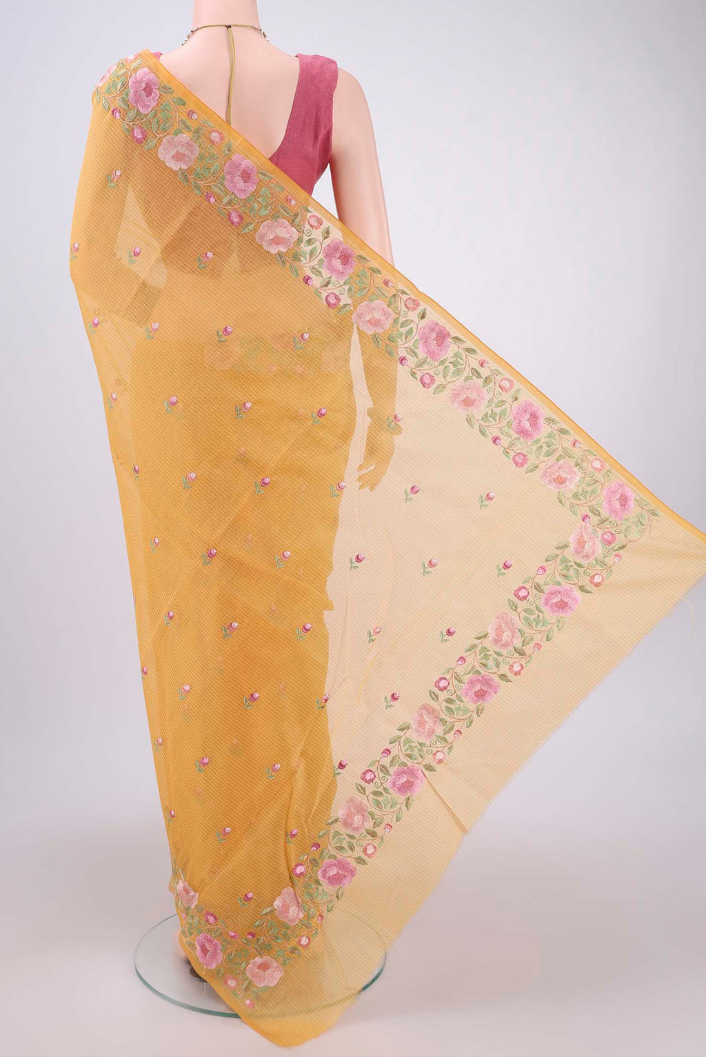Flat view of Yellow Kota Cotton Saree with Embroidery on the body and Thread Border. 