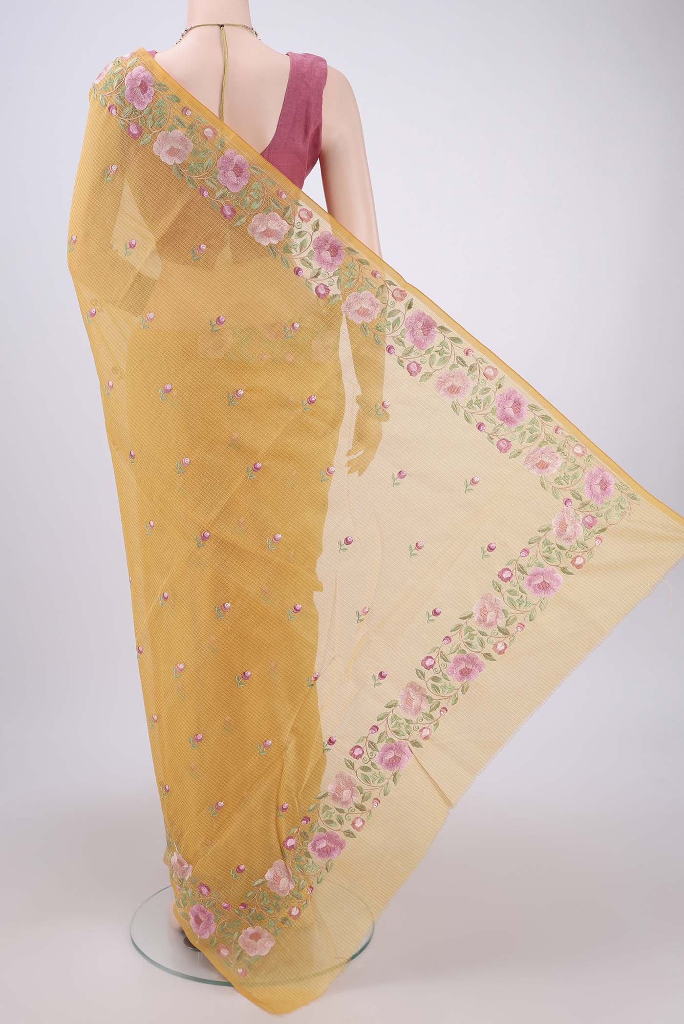 Flat view of Yellow Kota Cotton Saree with Embroidery on the body and Thread Border. 