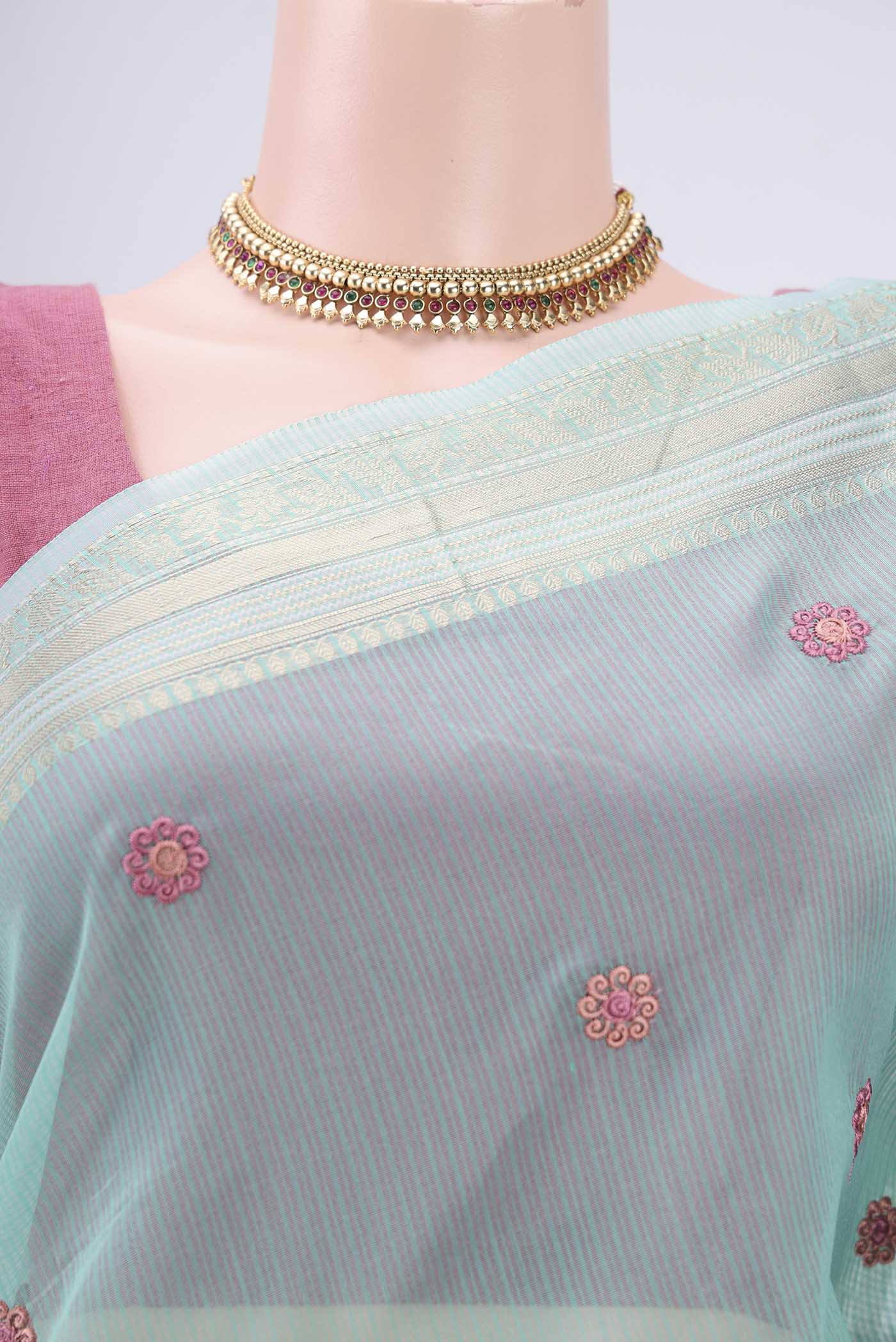 Border image of Turquoise Kota Silk Saree with Embroidery on the body and Plain Border. 