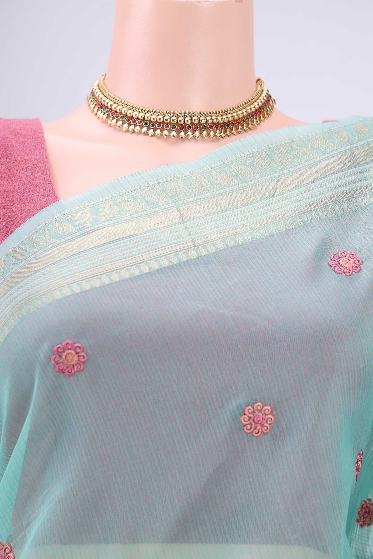 Border image of Turquoise Kota Silk Saree with Embroidery on the body and Plain Border. 