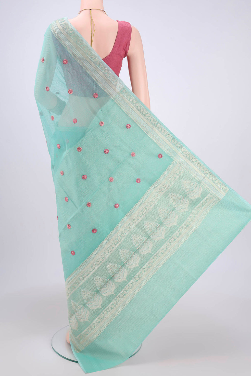 Flat view of Turquoise Kota Silk Saree with Embroidery on the body and Plain Border. 