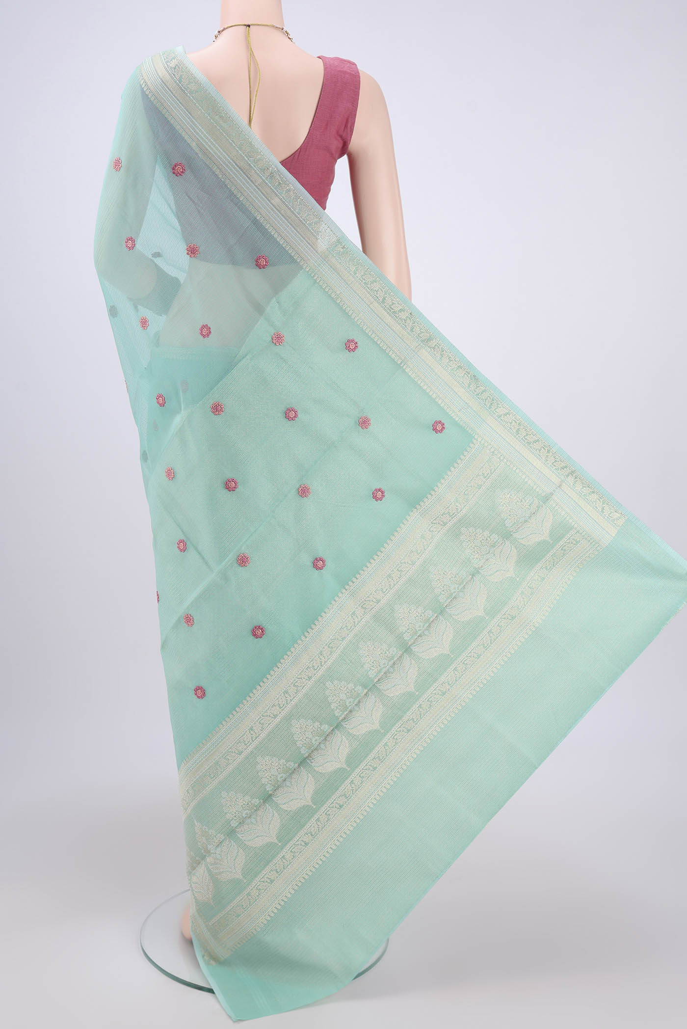 Flat view of Turquoise Kota Silk Saree with Embroidery on the body and Plain Border. 