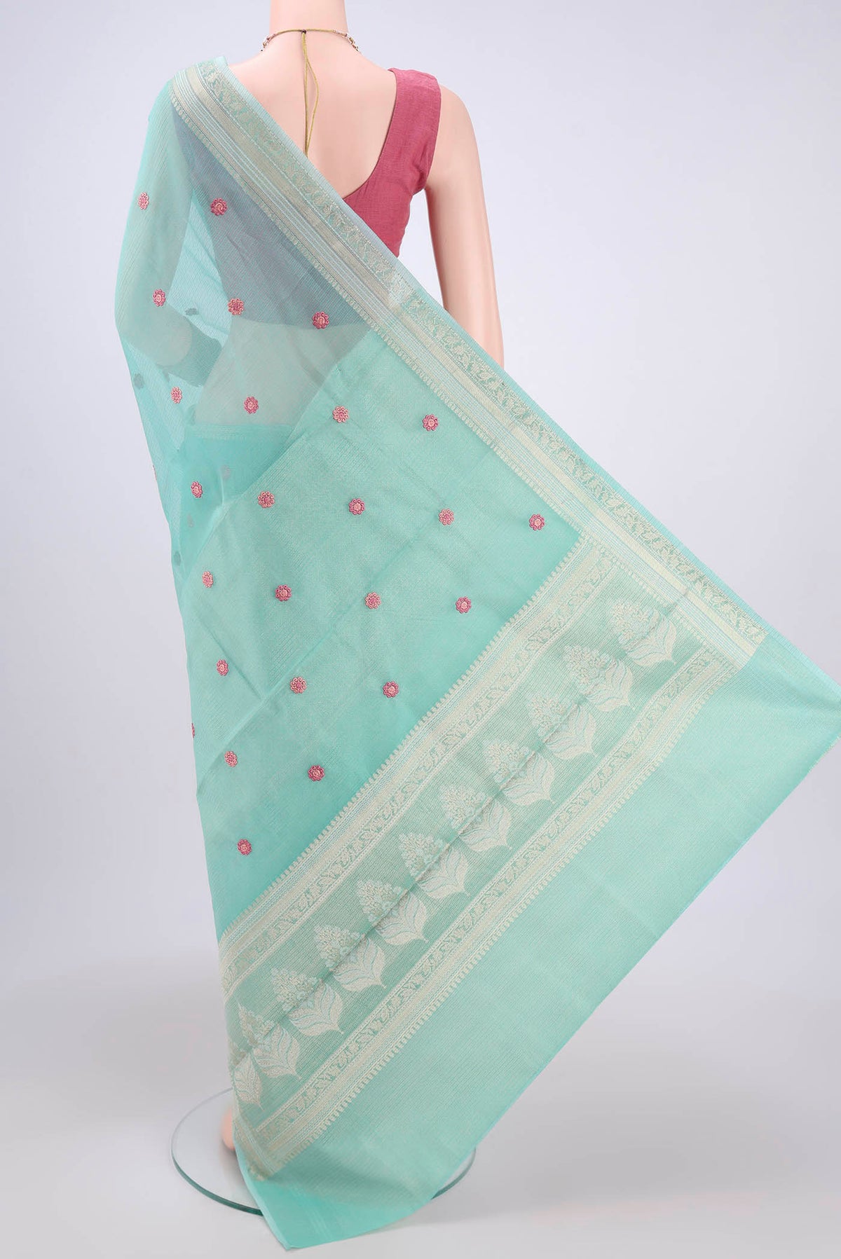 Flat view of Turquoise Kota Silk Saree with Embroidery on the body and Plain Border. 