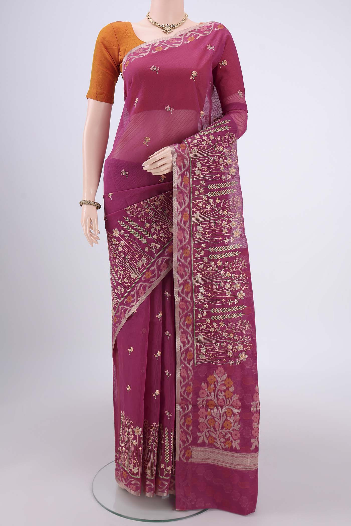 Dark Pink Kota Cotton Saree with Embroidery on the body and Zari Border.  displayed on a mannequin