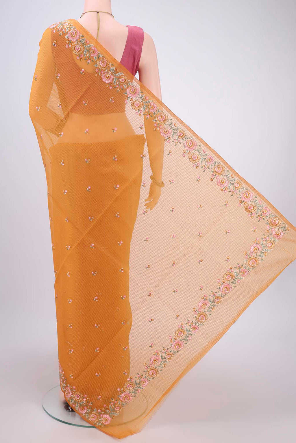 Flat view of Brick Orange Kota Cotton Saree with Embroidery on the body and Thread Border. 