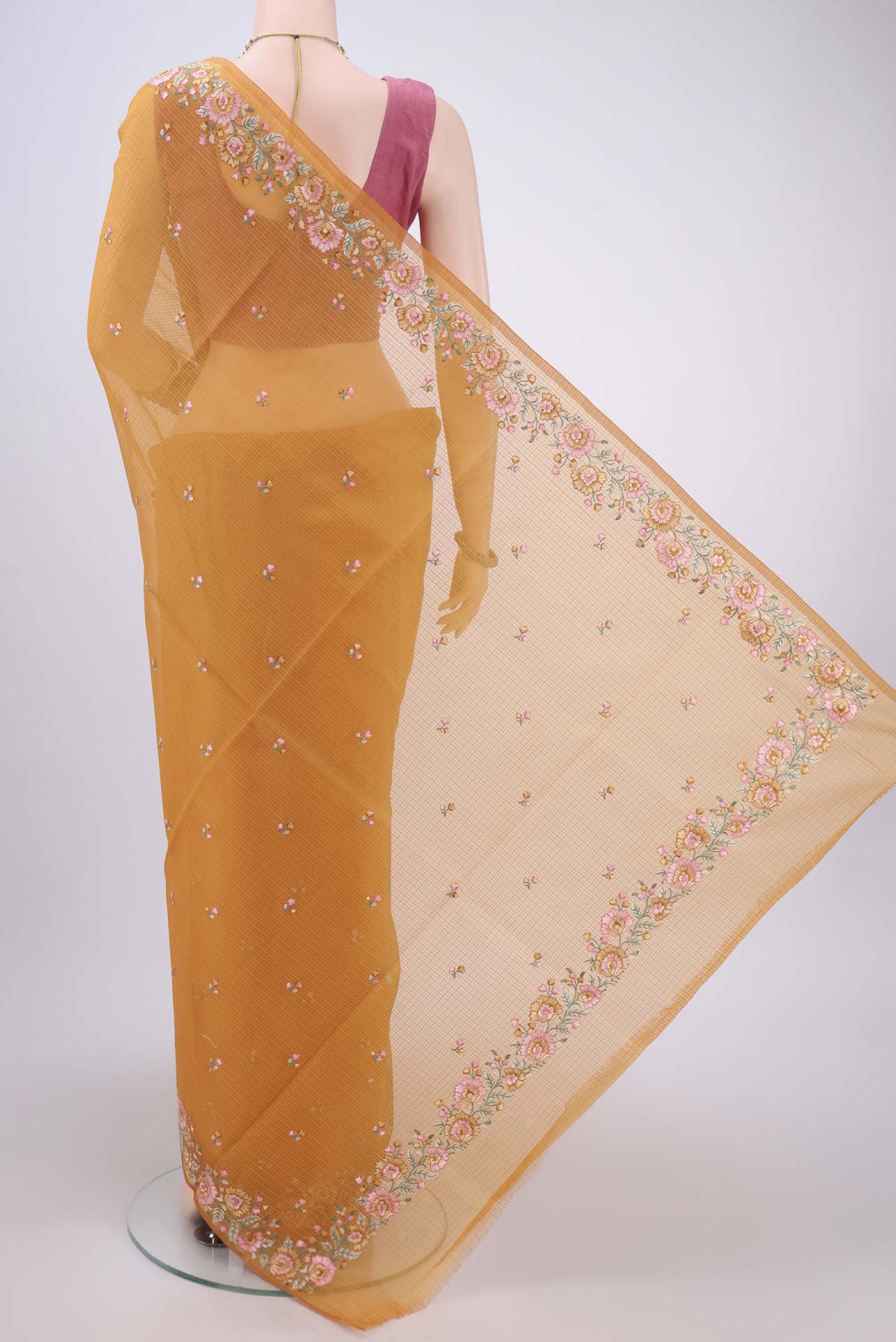 Flat view of Brick Orange Kota Cotton Saree with Embroidery on the body and Thread Border. 