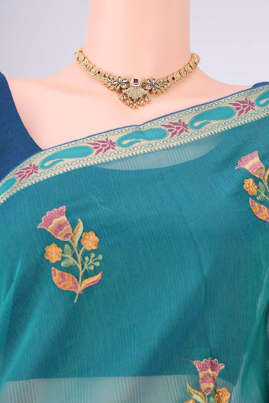 Border image of Peacock Blue Dual Tone Blended Kota Cotton Saree with Embroidery on the body and Zari And Thread Border. 