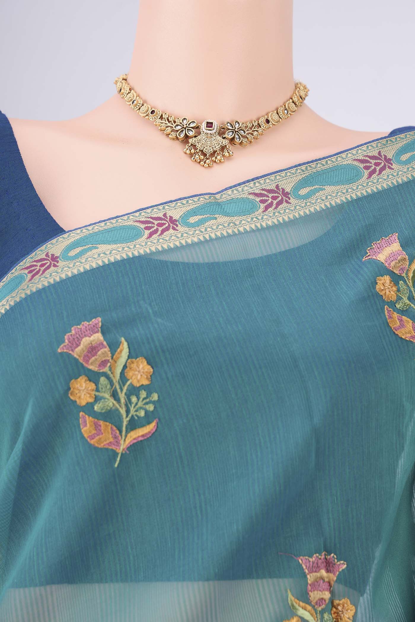 Border image of Peacock Blue Dual Tone Blended Kota Cotton Saree with Embroidery on the body and Zari And Thread Border. 