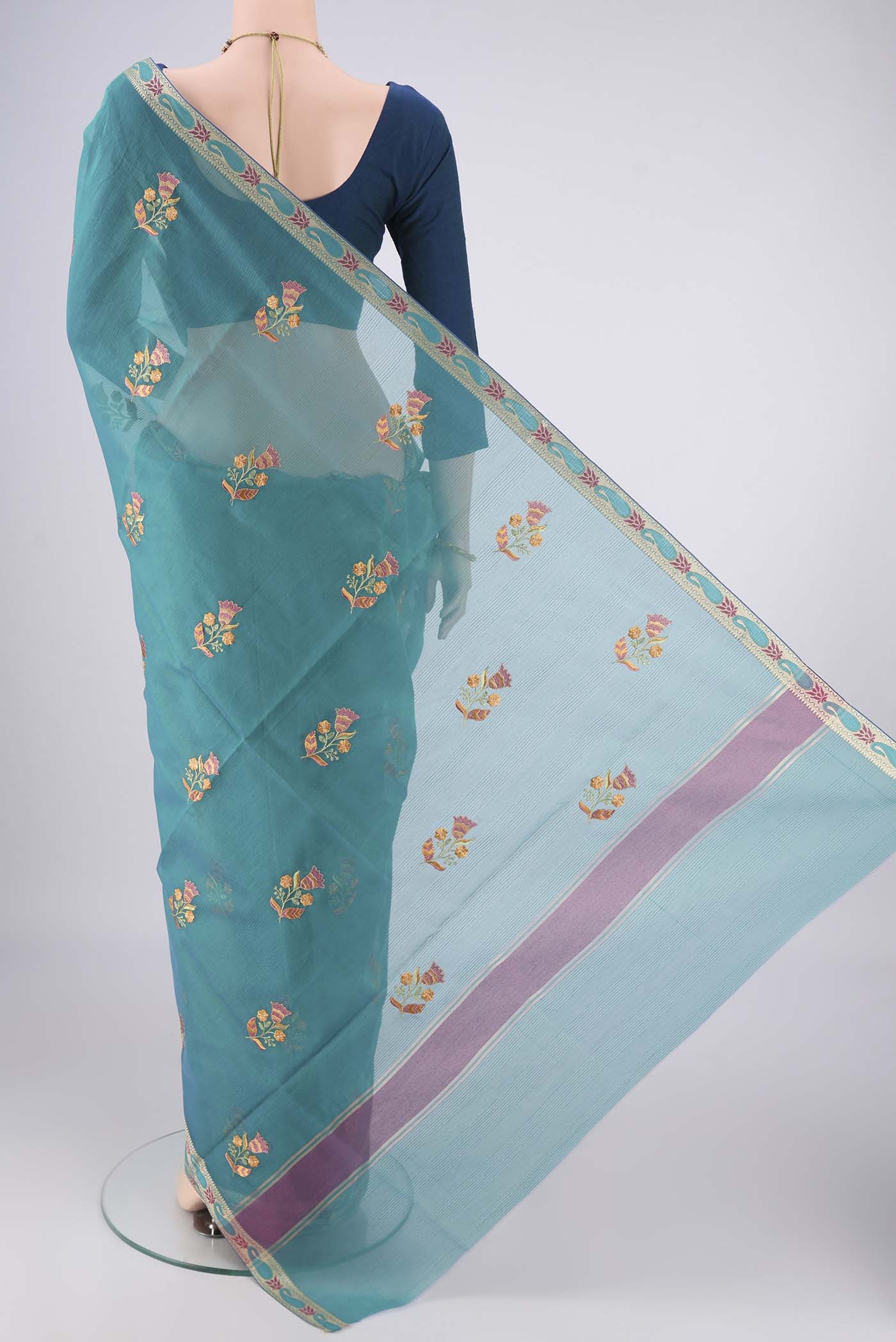 Flat view of Peacock Blue Dual Tone Blended Kota Cotton Saree with Embroidery on the body and Zari And Thread Border. 