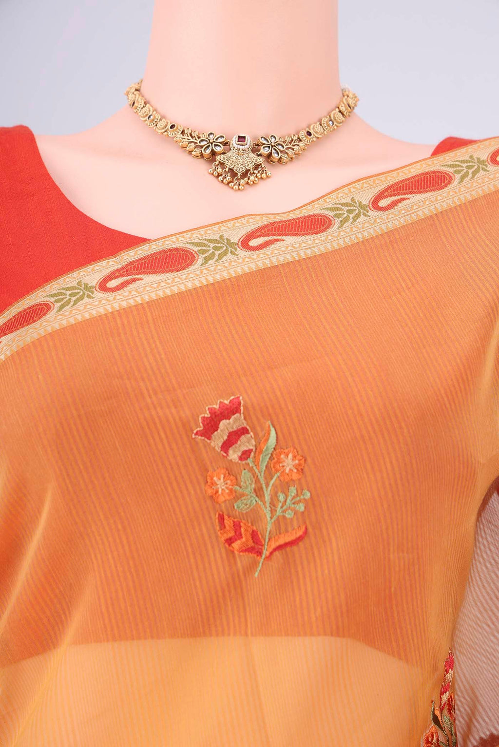 Border image of Sandal Blended Kota Cotton Saree with Embroidery on the body and Zari Border. 