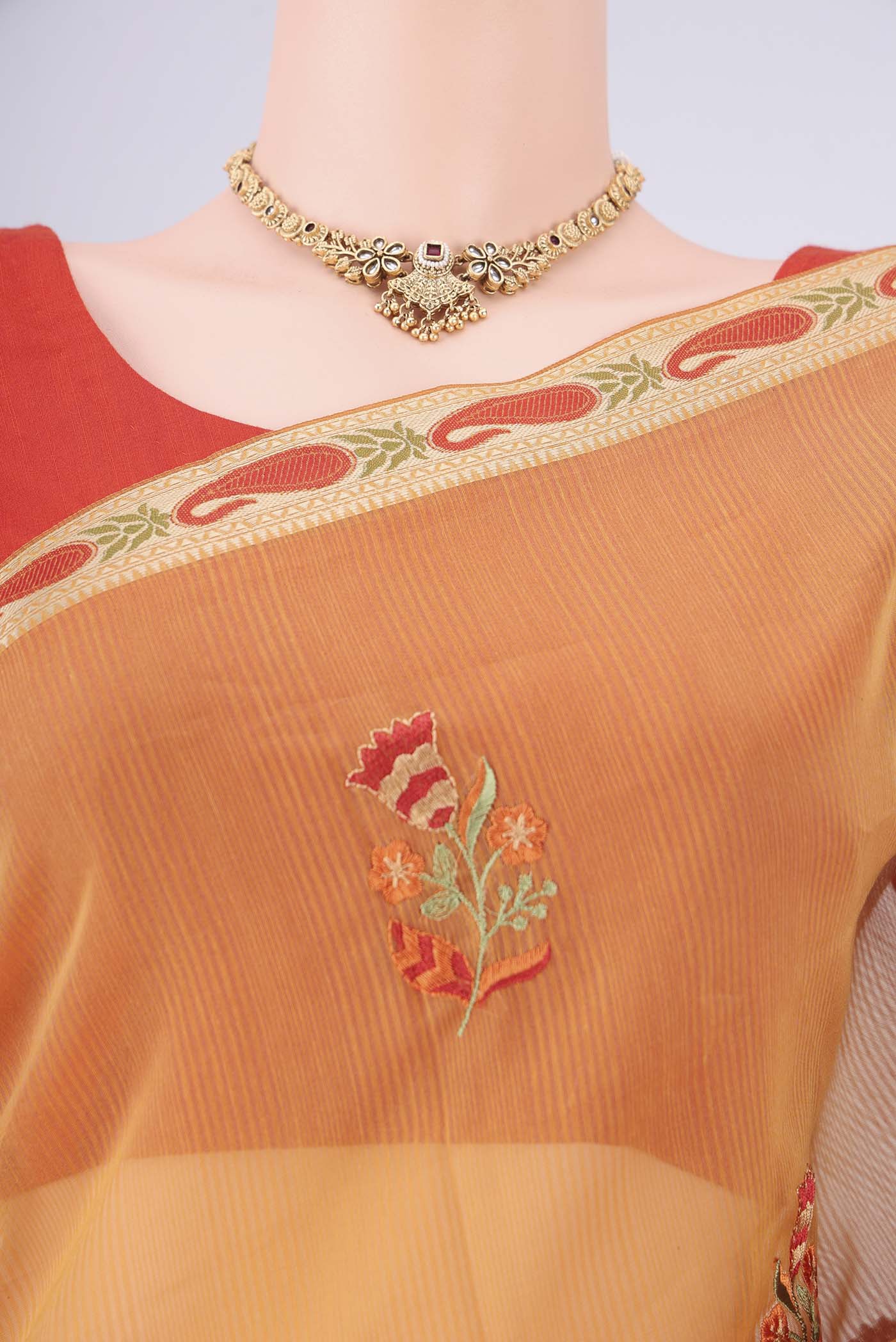 Border image of Sandal Blended Kota Cotton Saree with Embroidery on the body and Zari Border. 