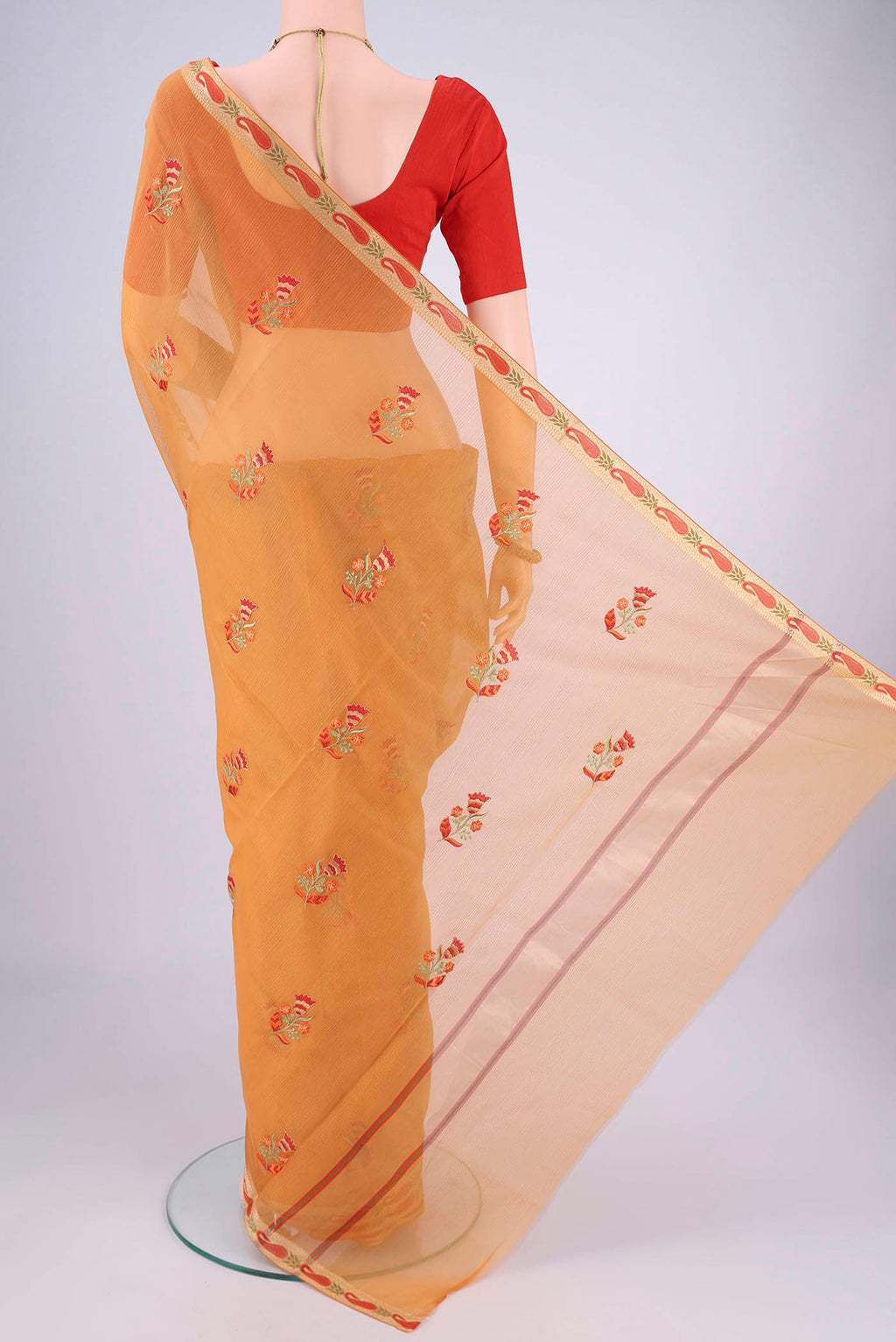 Flat view of Sandal Blended Kota Cotton Saree with Embroidery on the body and Zari Border. 