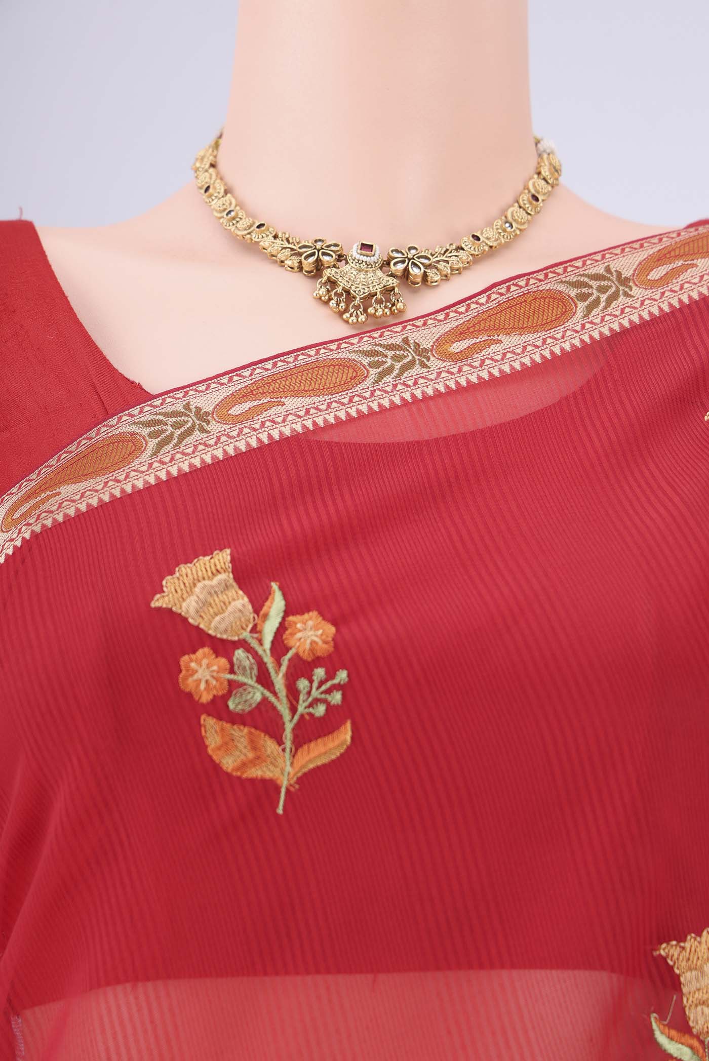 Border image of Red Blended Kota Cotton Saree with Embroidery on the body and Zari And Thread Border. 