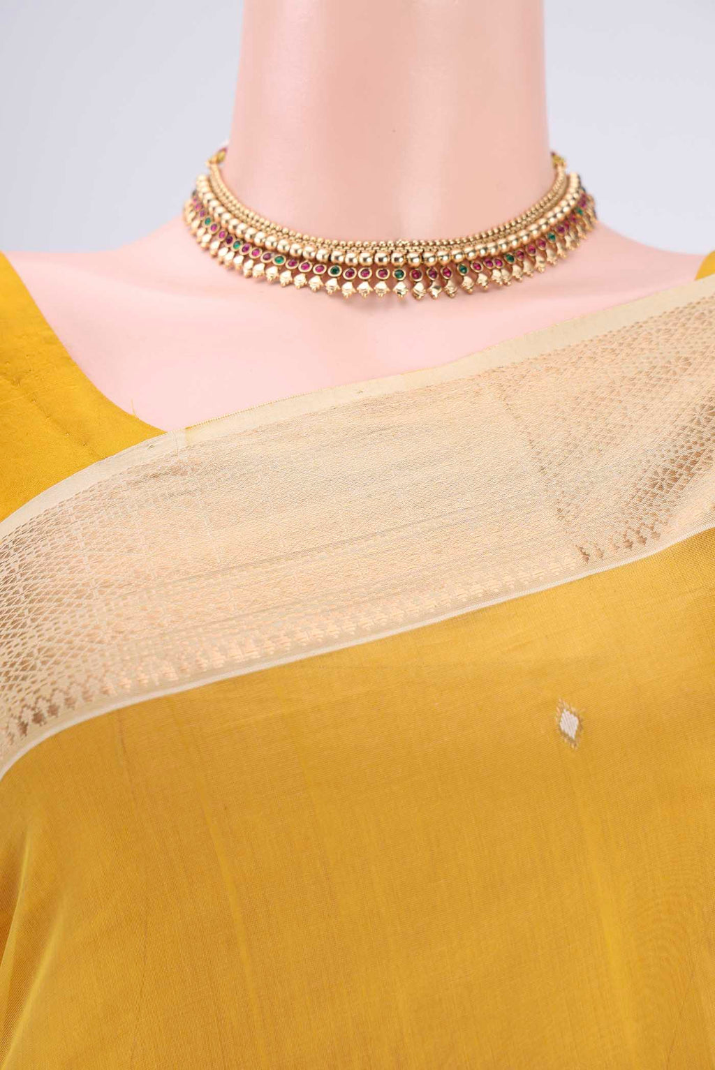 Border image of Yellow Maheshwari Silk Cotton Saree with Zari Butta on the body and Zari Border. 