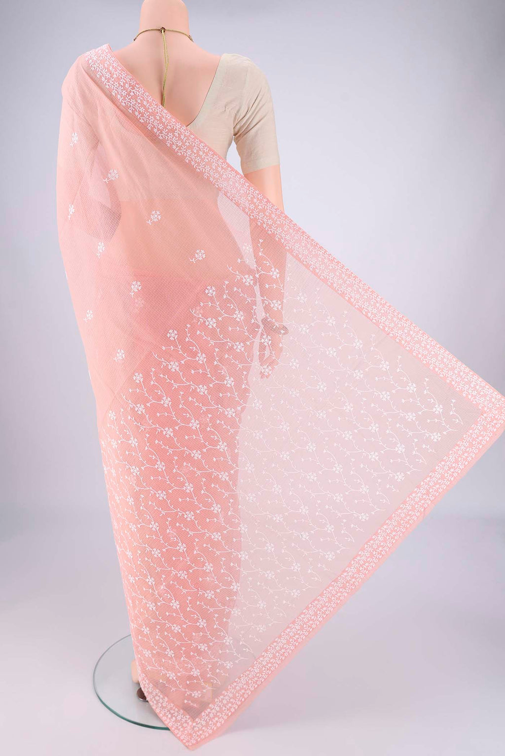 Flat view of Peach Blended Kota Cotton Saree with Embroidery on the body and Checks Border. 
