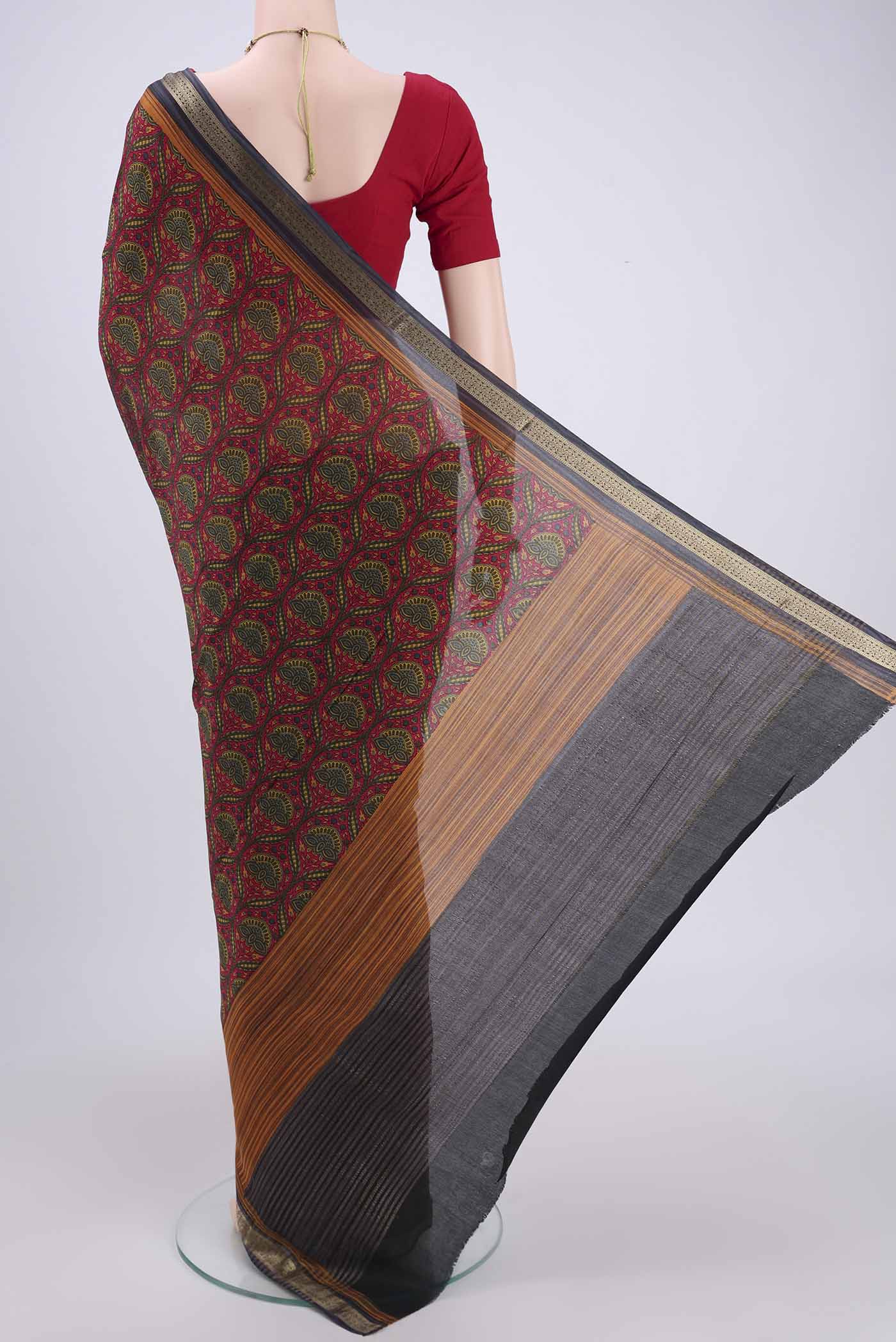 Flat view of Red Mysore Crepe Saree with Floral Print on the body and Zari Border. 
