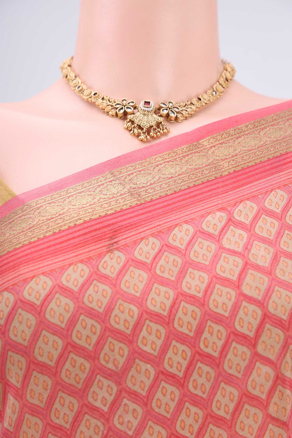 Border image of Pink Mysore Crepe Saree with Floral Print on the body and Zari Border. 