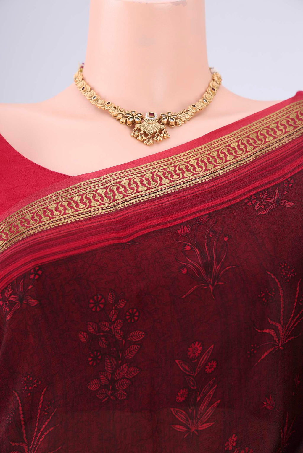 Border image of Maroon Mysore Crepe Saree with Printed design on the body and Zari Border. 