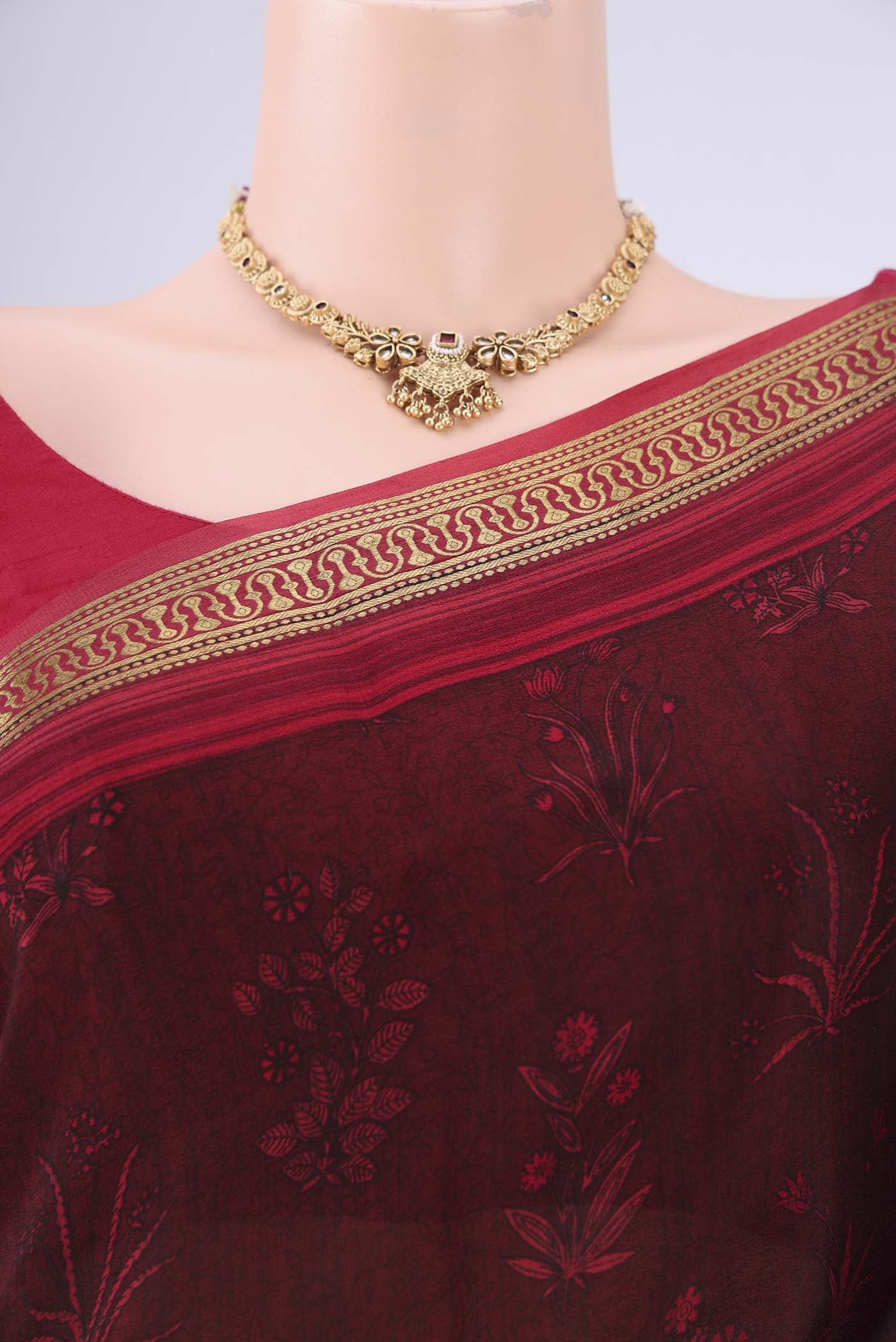 Border image of Maroon Mysore Crepe Saree with Printed design on the body and Zari Border. 