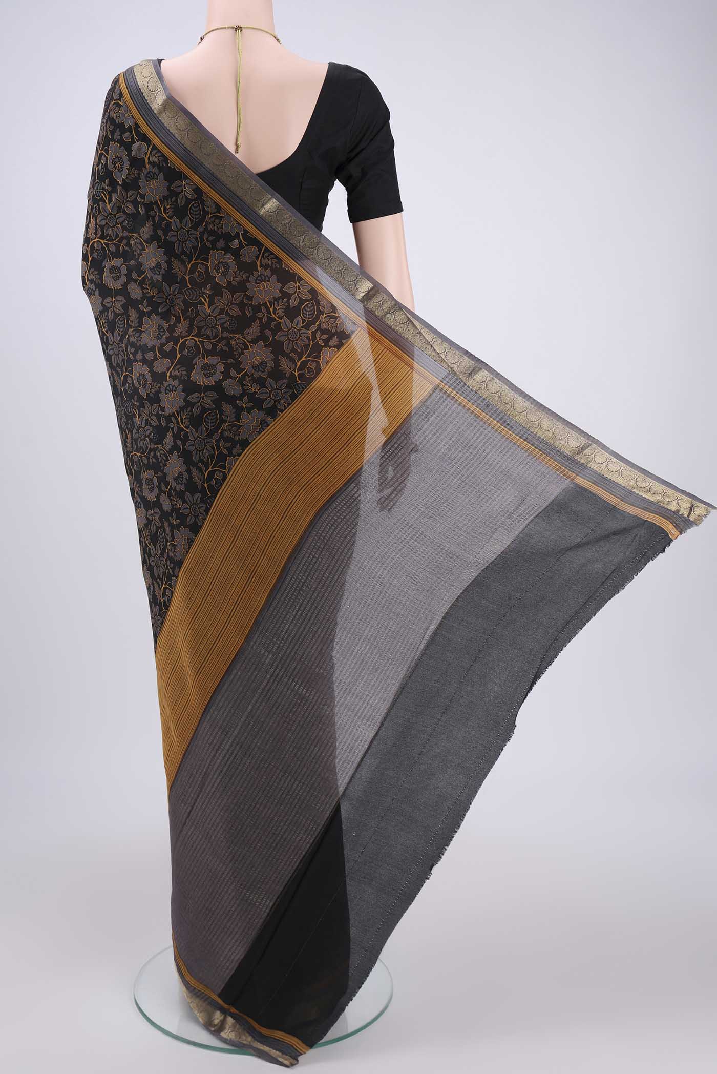 Flat view of Black Mysore Crepe Saree with Floral Print on the body and Zari Border. 