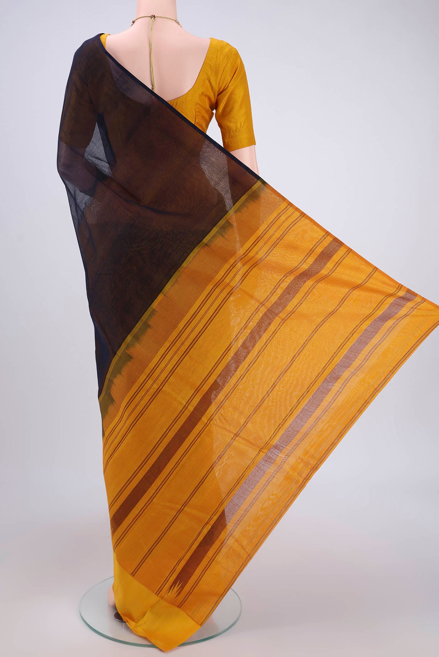 Flat view of Dark Blue Kanchi Cotton Saree with Checked design on the body and Zari Border. 