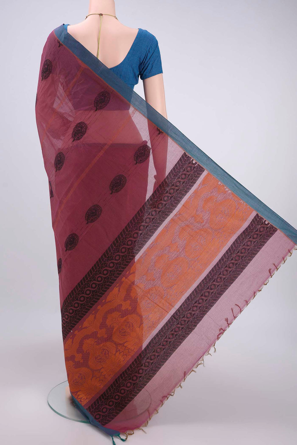 Flat view of Light Magenta Kanchi Cotton Saree with Thread Butta on the body and Plain Border. 
