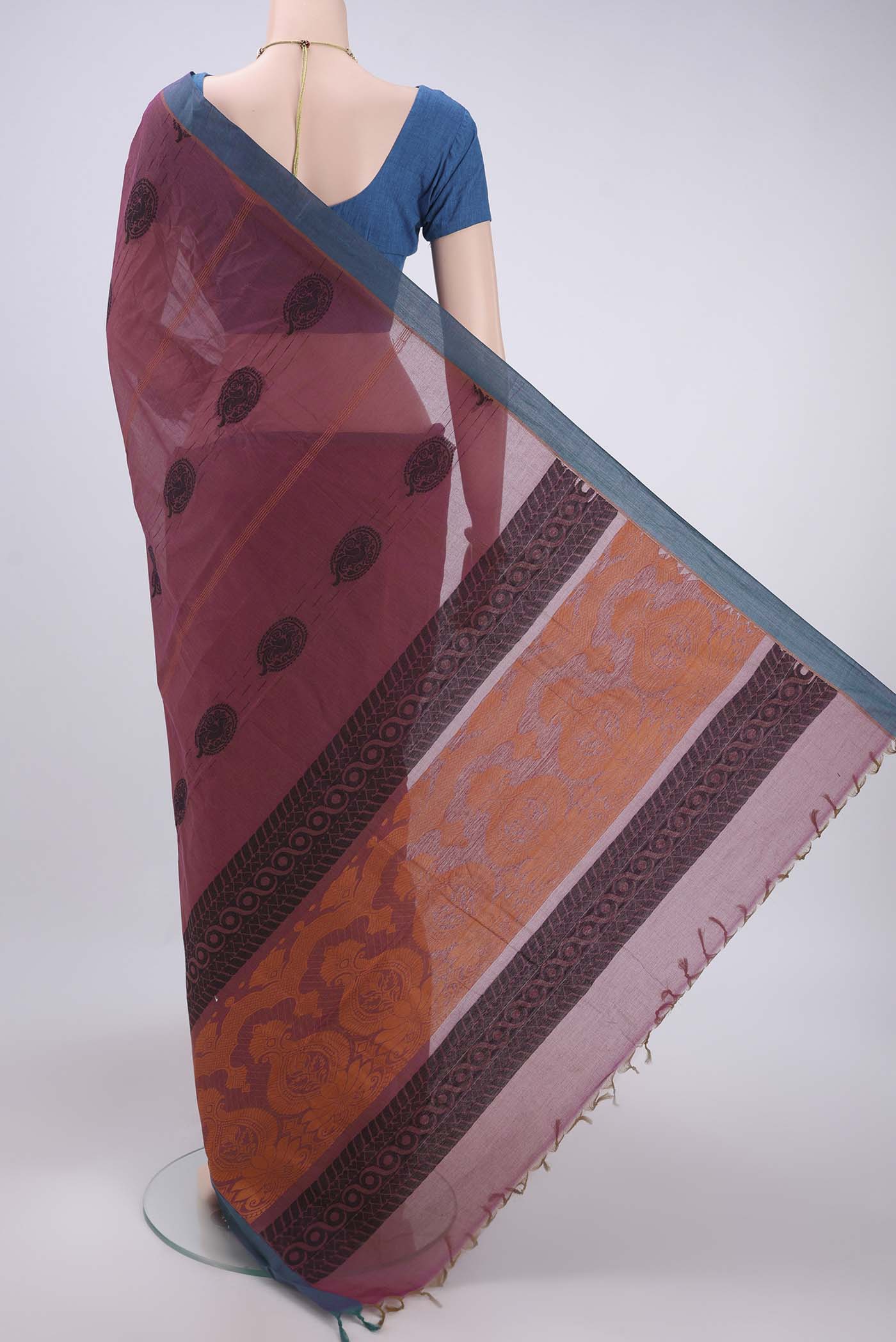 Flat view of Light Magenta Kanchi Cotton Saree with Thread Butta on the body and Plain Border. 