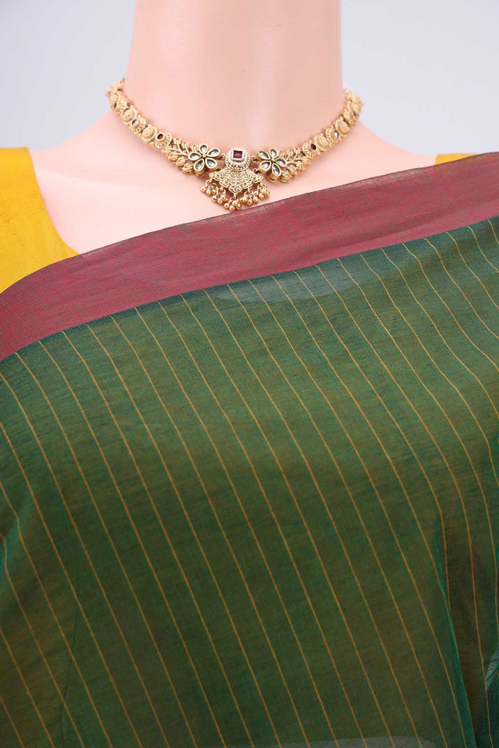 Border image of Bottle Green Kanchi Cotton Saree with Thread Butta on the body and Plain Border. 