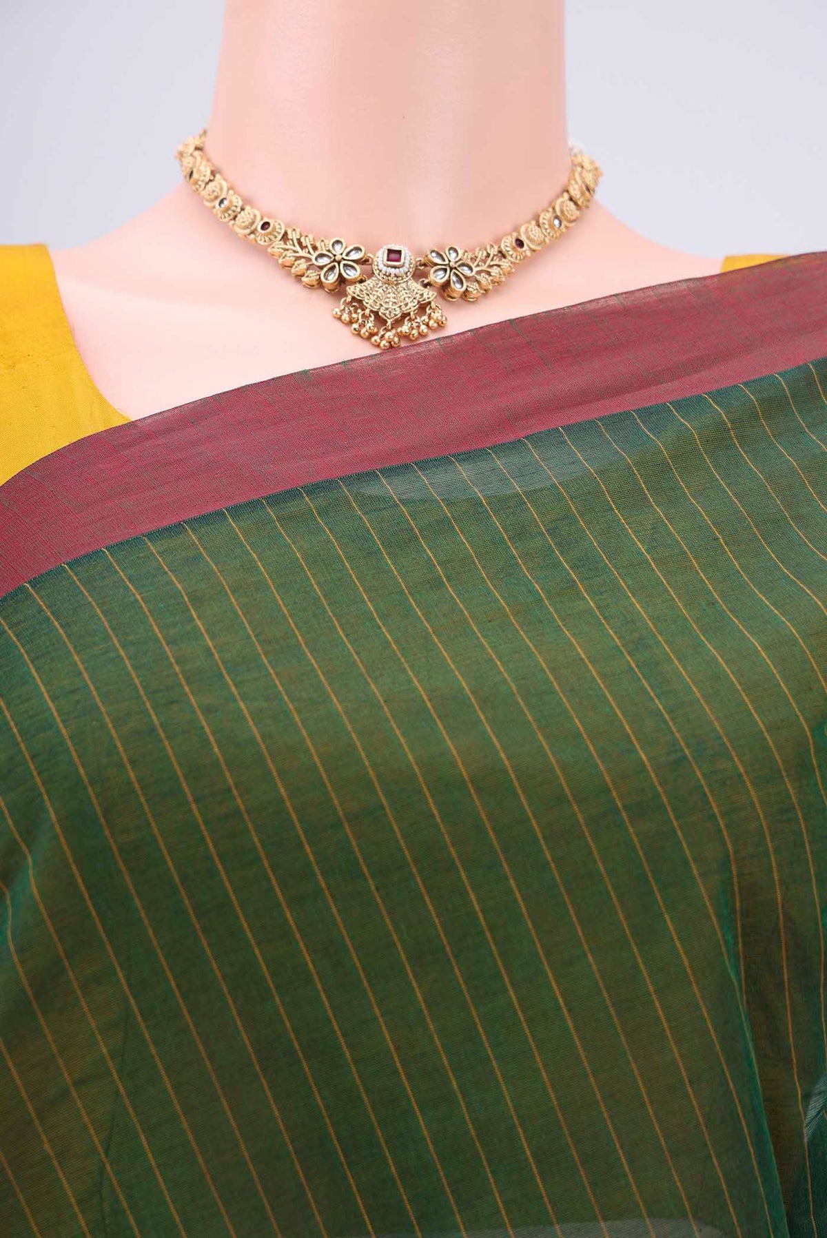 Border image of Bottle Green Kanchi Cotton Saree with Thread Butta on the body and Plain Border. 