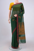 Bottle Green Kanchi Cotton Saree with Thread Butta on the body and Plain Border.  displayed on a mannequin