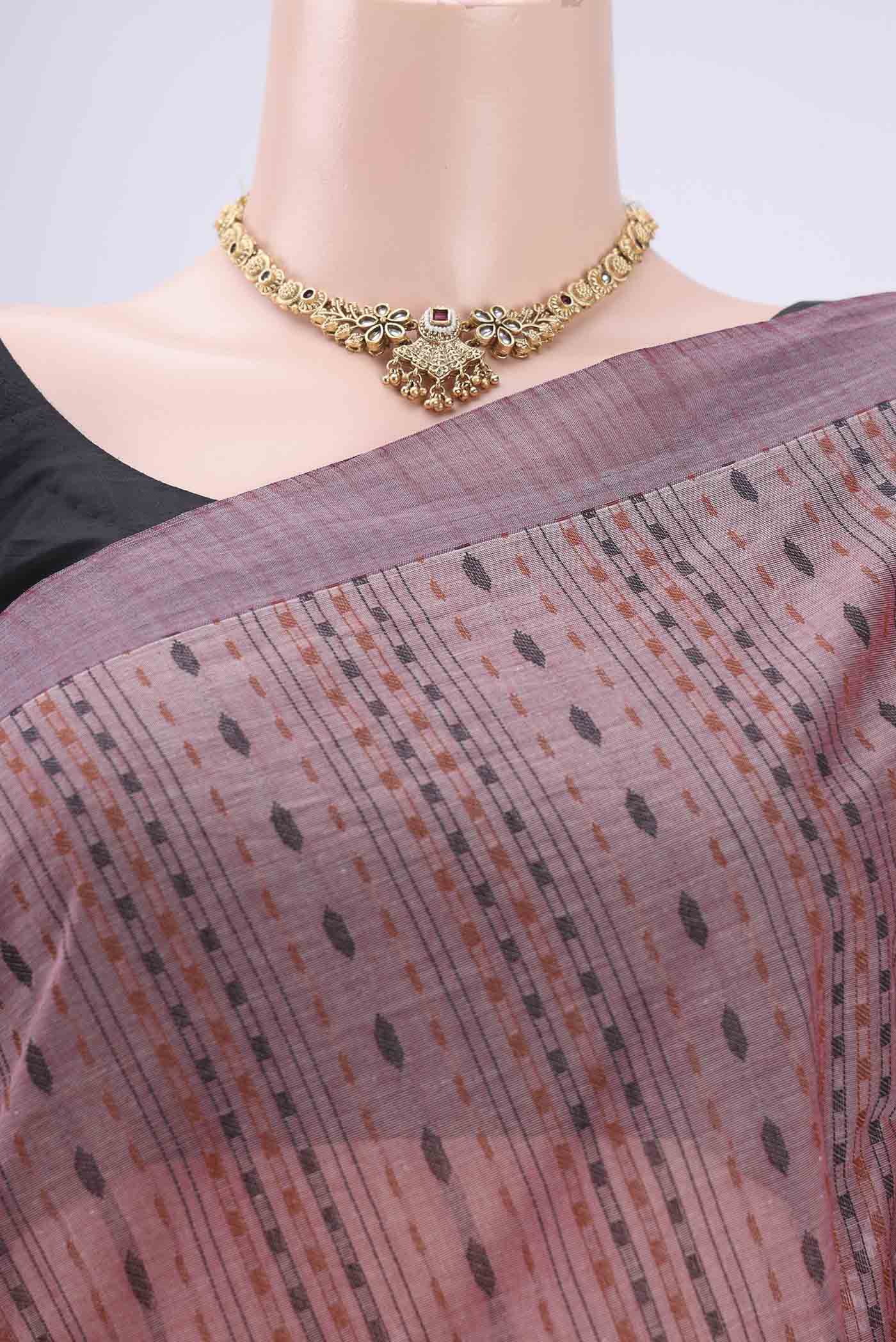 Border image of Rose pink Kanchi Cotton Saree with Stripes on the body and Plain Border. 