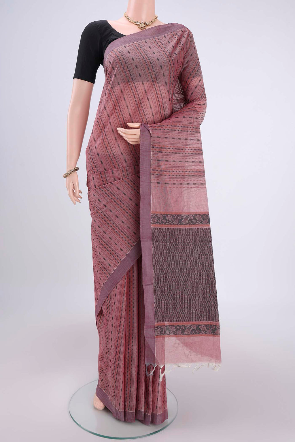 Rose pink Kanchi Cotton Saree with Stripes on the body and Plain Border.  displayed on a mannequin