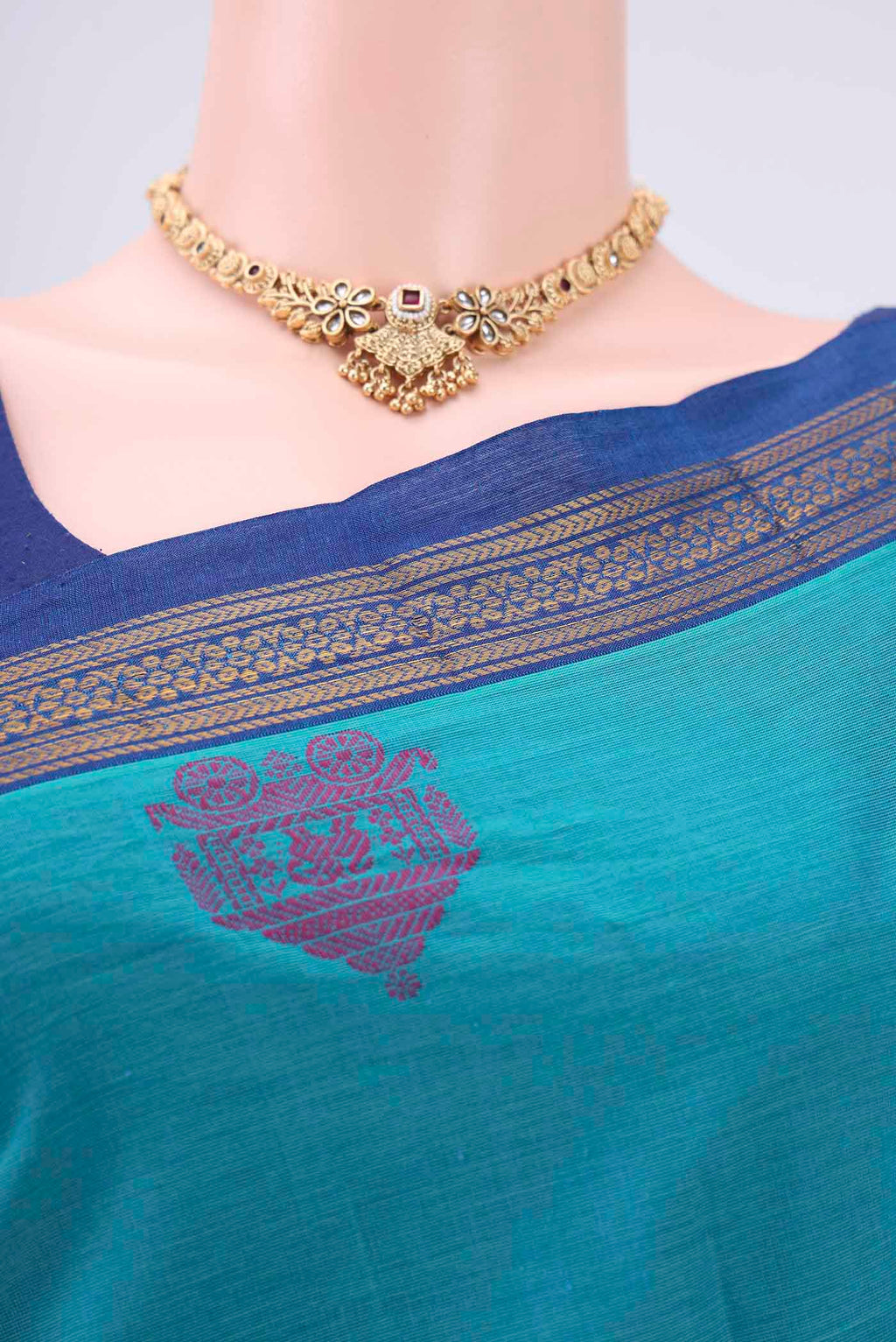 Border image of Turquoise Kanchi Cotton Saree with Thread Butta on the body and Thread Border. 