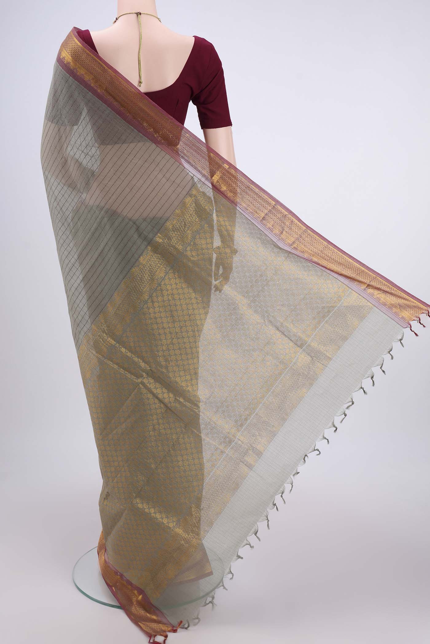 Flat view of Grey Kanchi Cotton Saree with Stripes on the body and Thread Border. 