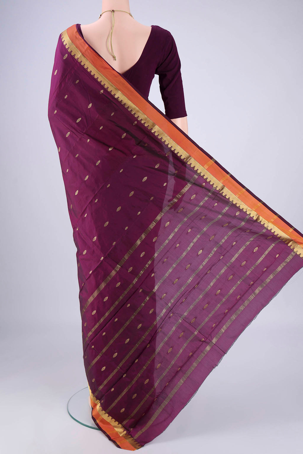 Flat view of Purple Blended Bangalore Silk Saree with Zari Butta on the body and Zari Border. 