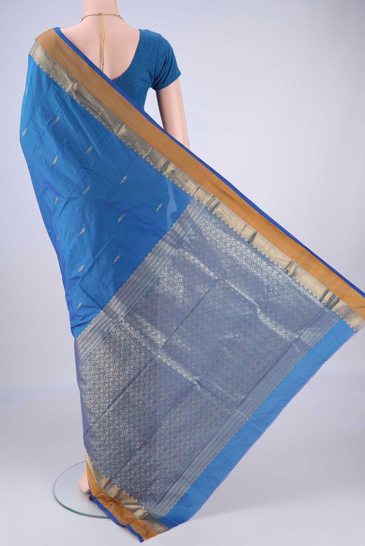Flat view of Blue Blended Bangalore Silk Saree with Zari Butta on the body and Zari Border. 