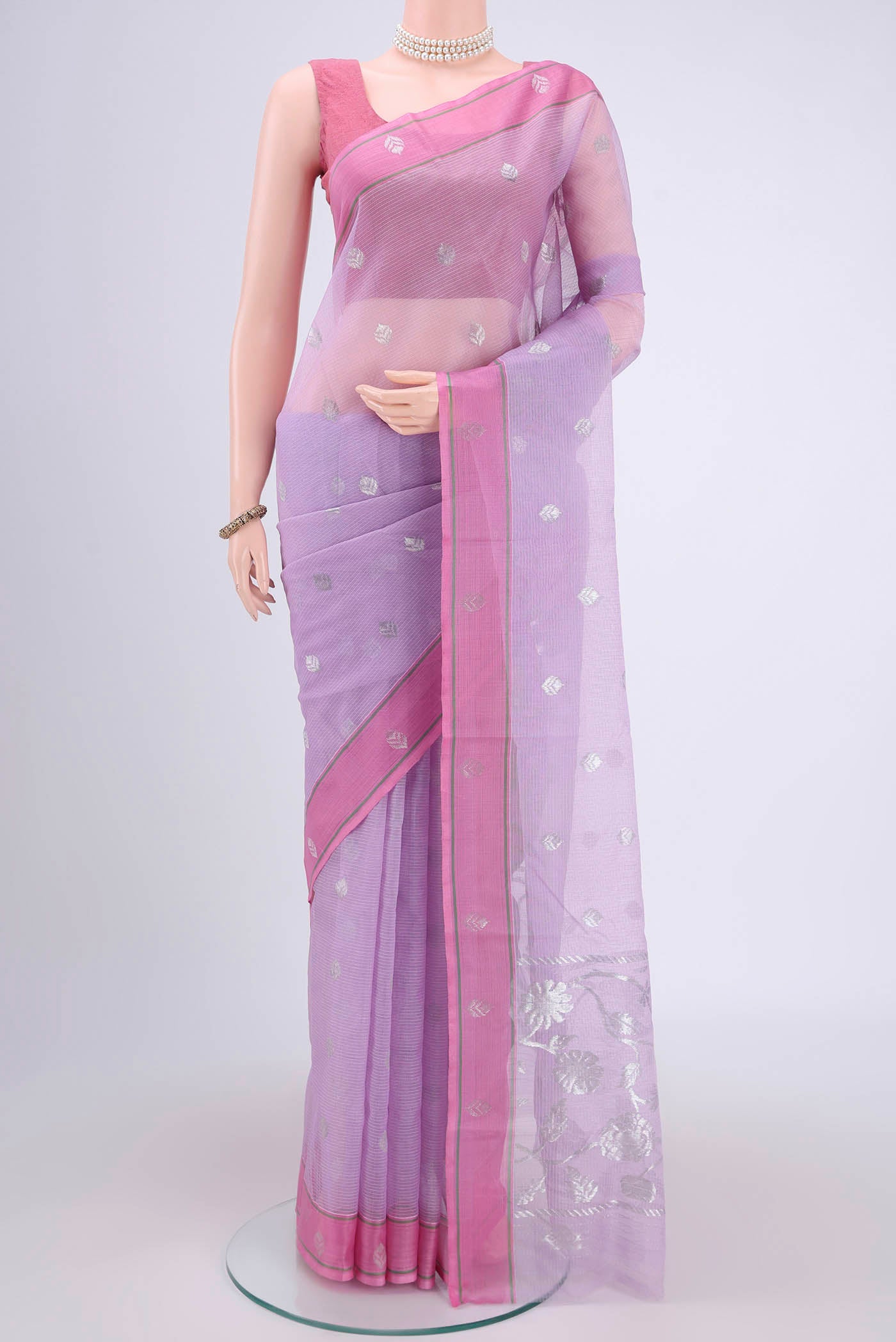 Pure Silk Pure Zari Lavender Kota Saree with Zari Butta on the body and Zari Border.  displayed on a mannequin