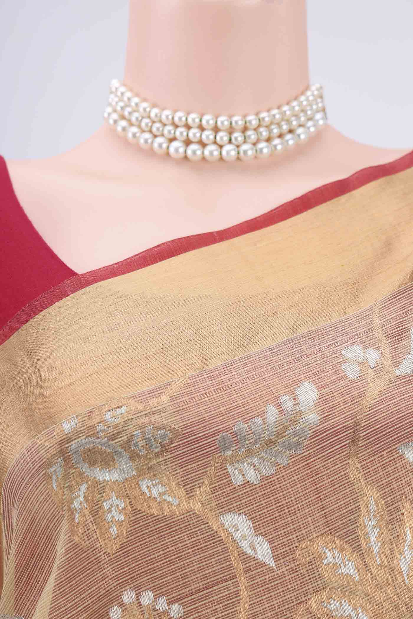 Border image of Pure Silk Pure Zari Beige Kota Saree with Zari Butta on the body and Zari Border. 