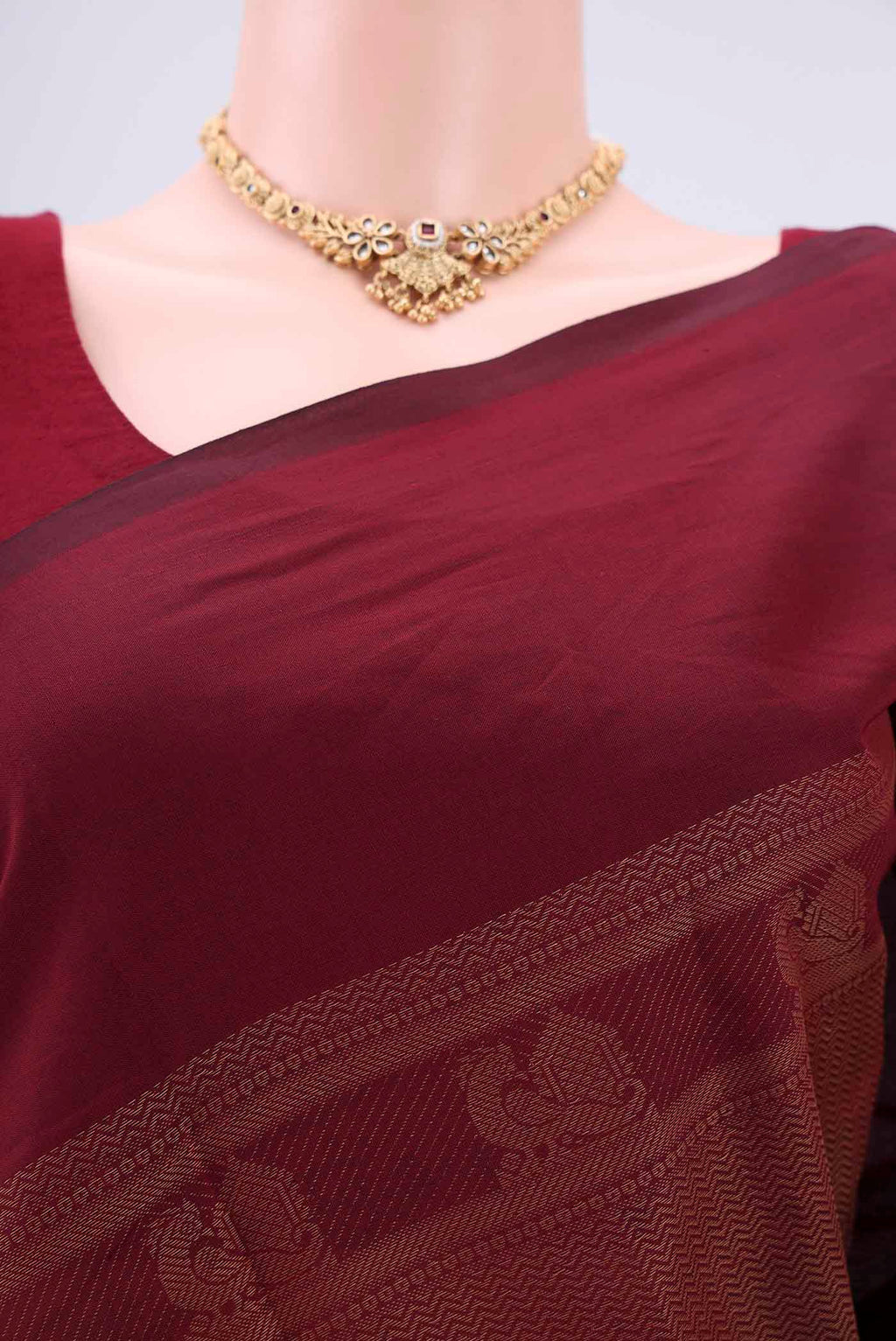 Border image of Maroon Blended Poly Cotton Saree with Jacquard design on the body and Plain Border. 