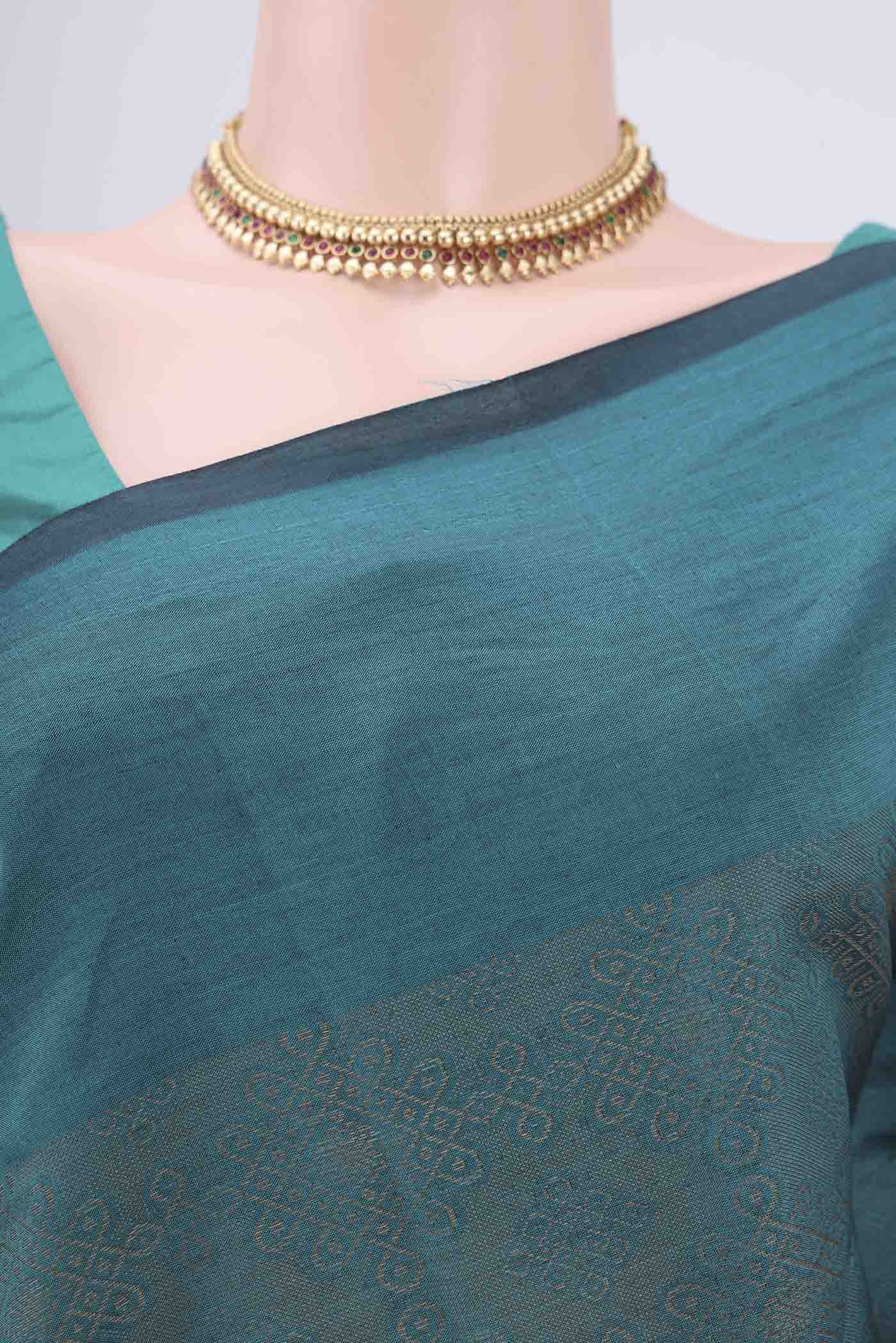 Border image of Sea Green Blended Poly Cotton Saree with Jacquard design on the body and Plain Border. 
