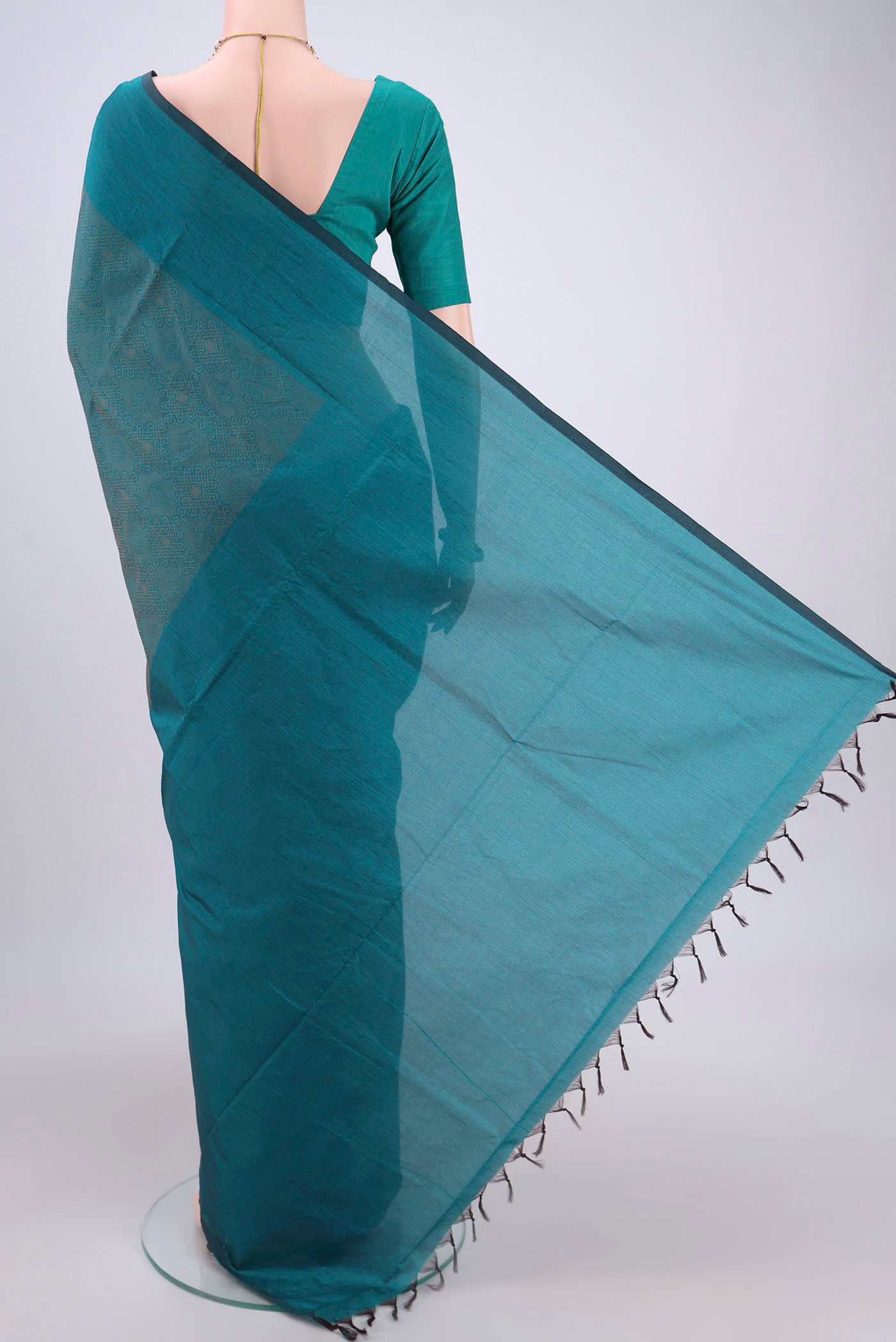 Flat view of Sea Green Blended Poly Cotton Saree with Jacquard design on the body and Plain Border. 